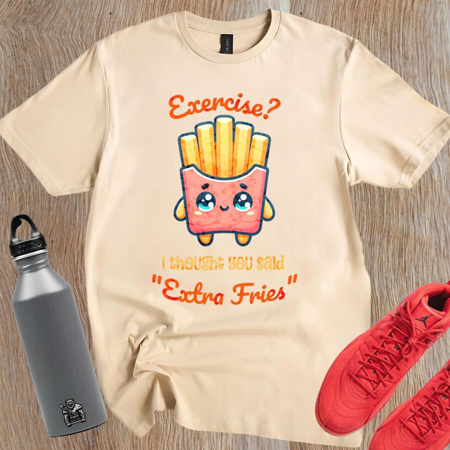 Humorous gym T-shirt featuring "Exercise? I thought you said 'Extra Fries'" graphic, perfect for fitness lovers who enjoy snacks.