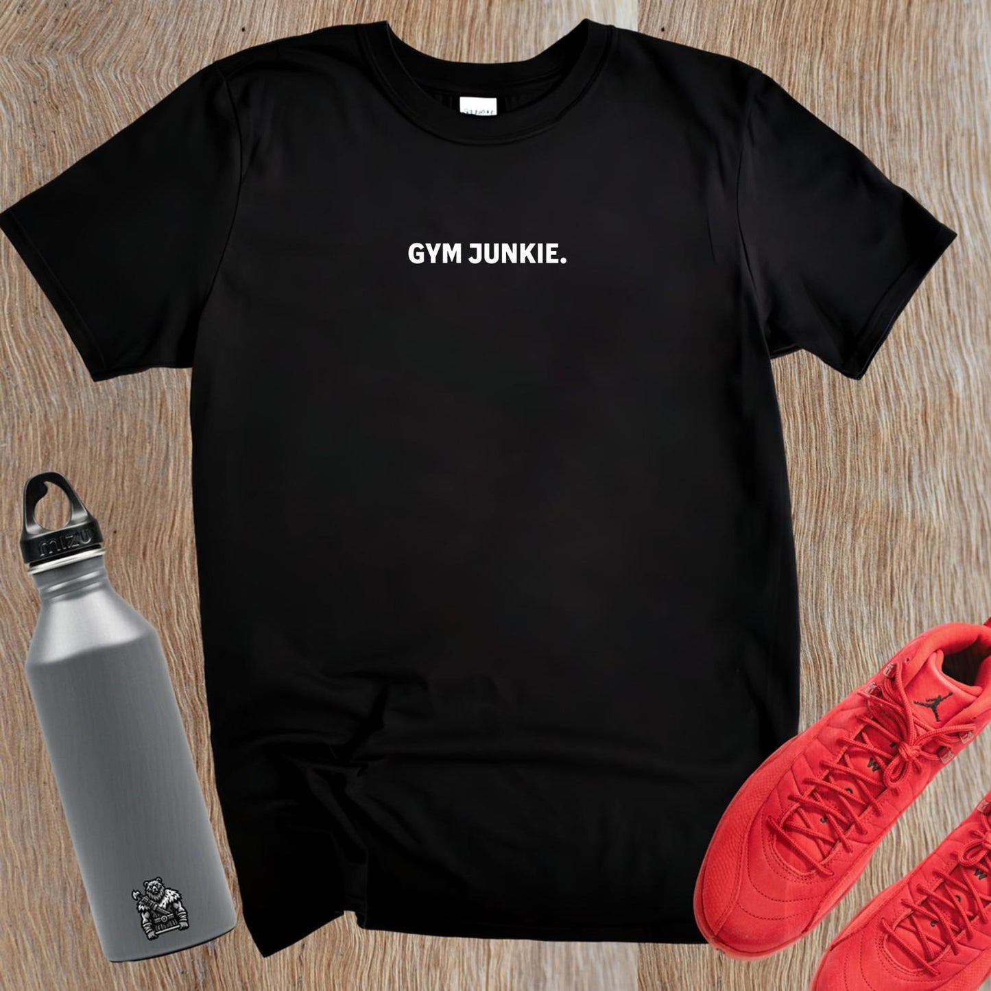 "Bold 'Gym Junkie' T-shirt featuring stylish typography, perfect for fitness enthusiasts. Ideal for workouts or casual outings."