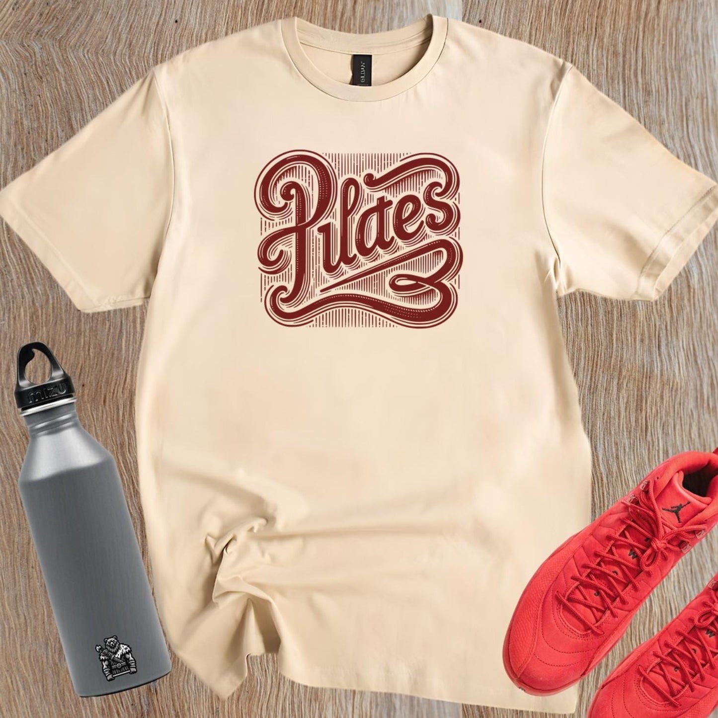 Alt text: "Stylish Pilates T-shirt featuring a bold, intricate graphic embodying wellness and discipline, perfect for fitness enthusiasts."