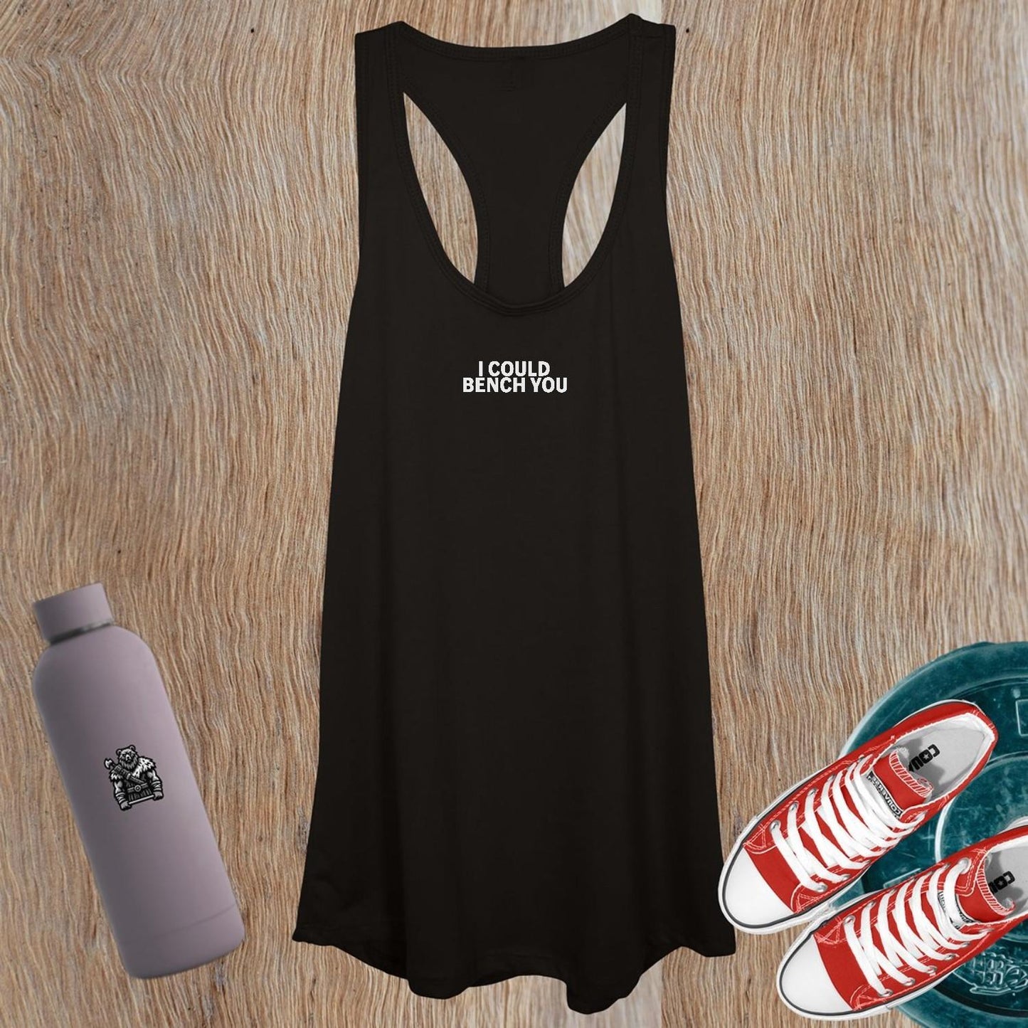 Alt text: "Bold Women's Tank Top in vibrant color featuring empowering phrase 'I Could Bench You' represents fierce gym style and confidence."