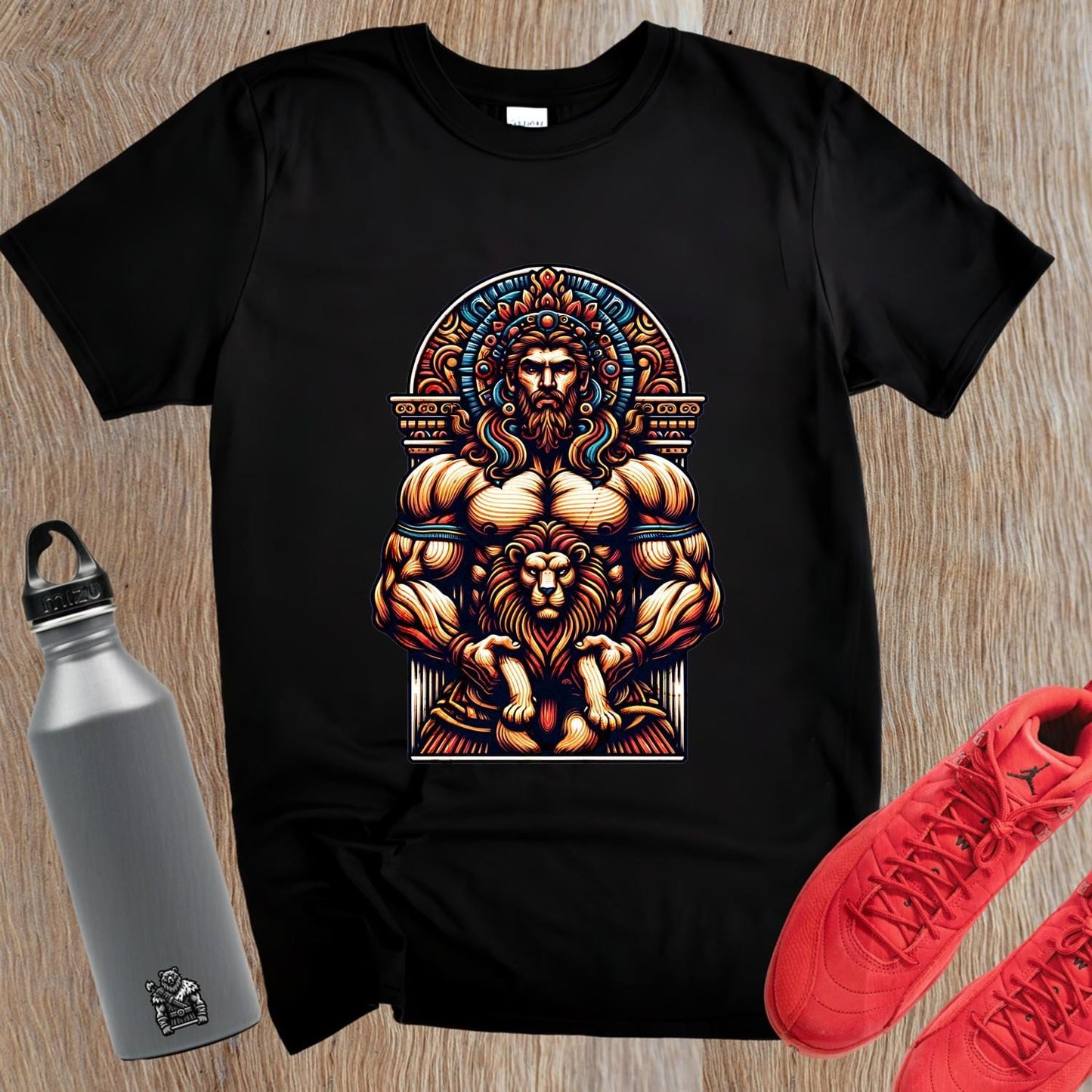 "Bold gym T-shirt featuring a strong muscular figure with a lion, symbolizing courage. Perfect for workouts and casual wear."