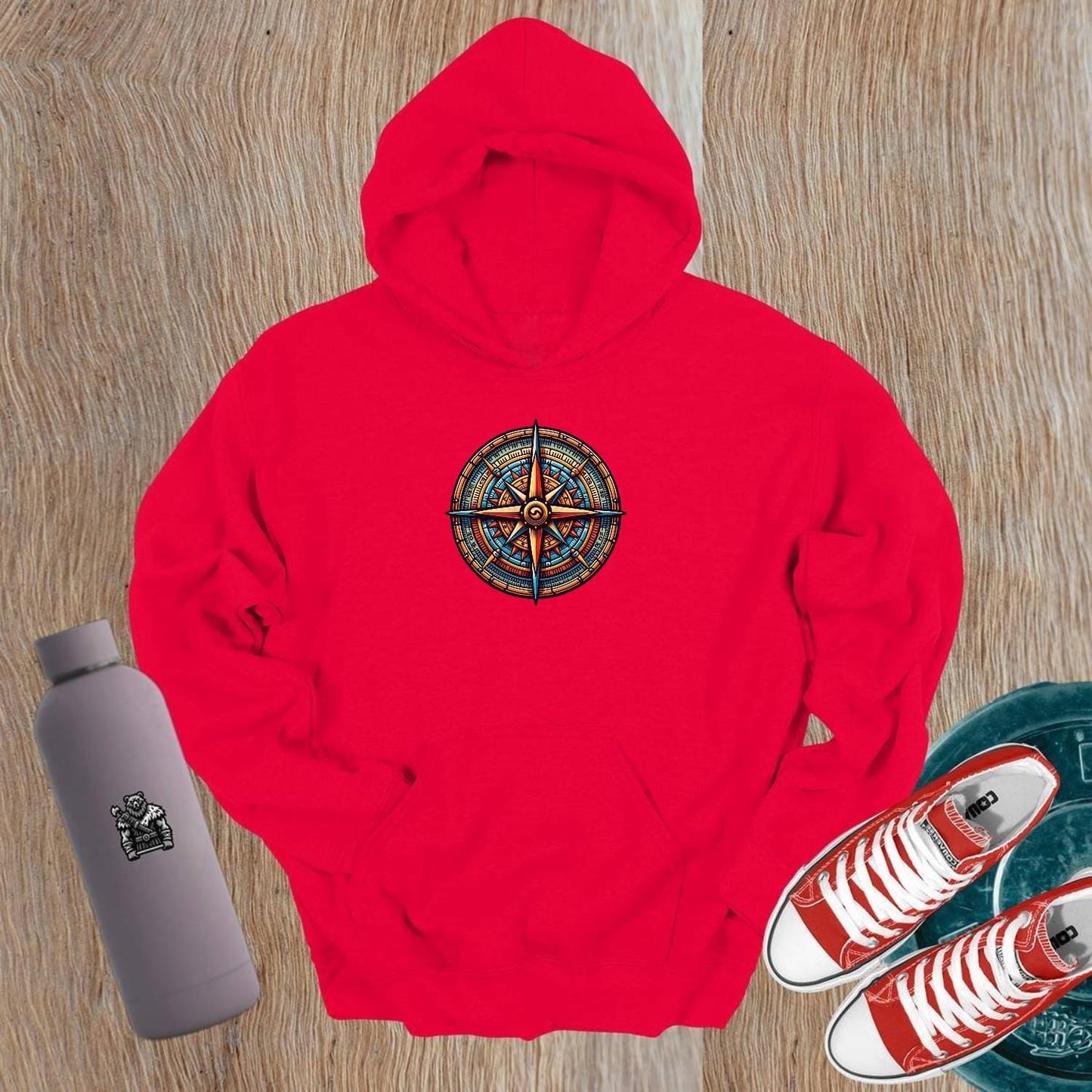 "Vibrant Compass Hoodie for gym enthusiasts features an intricate compass design, perfect for stylish layering pre- or post-workout."