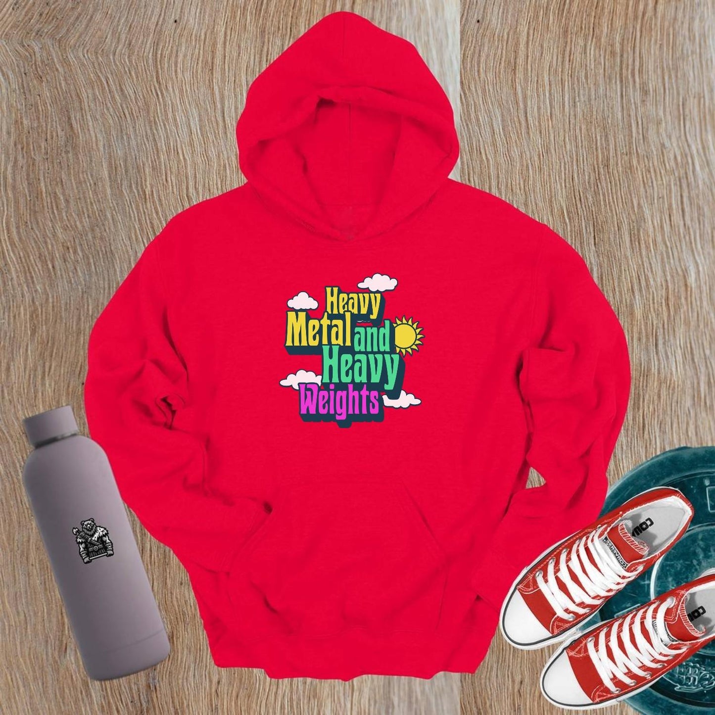 "Heavy Metal and Heavy Weights hoodie featuring vibrant graphics of weights and musical elements, perfect for fitness enthusiasts and gym lovers."
