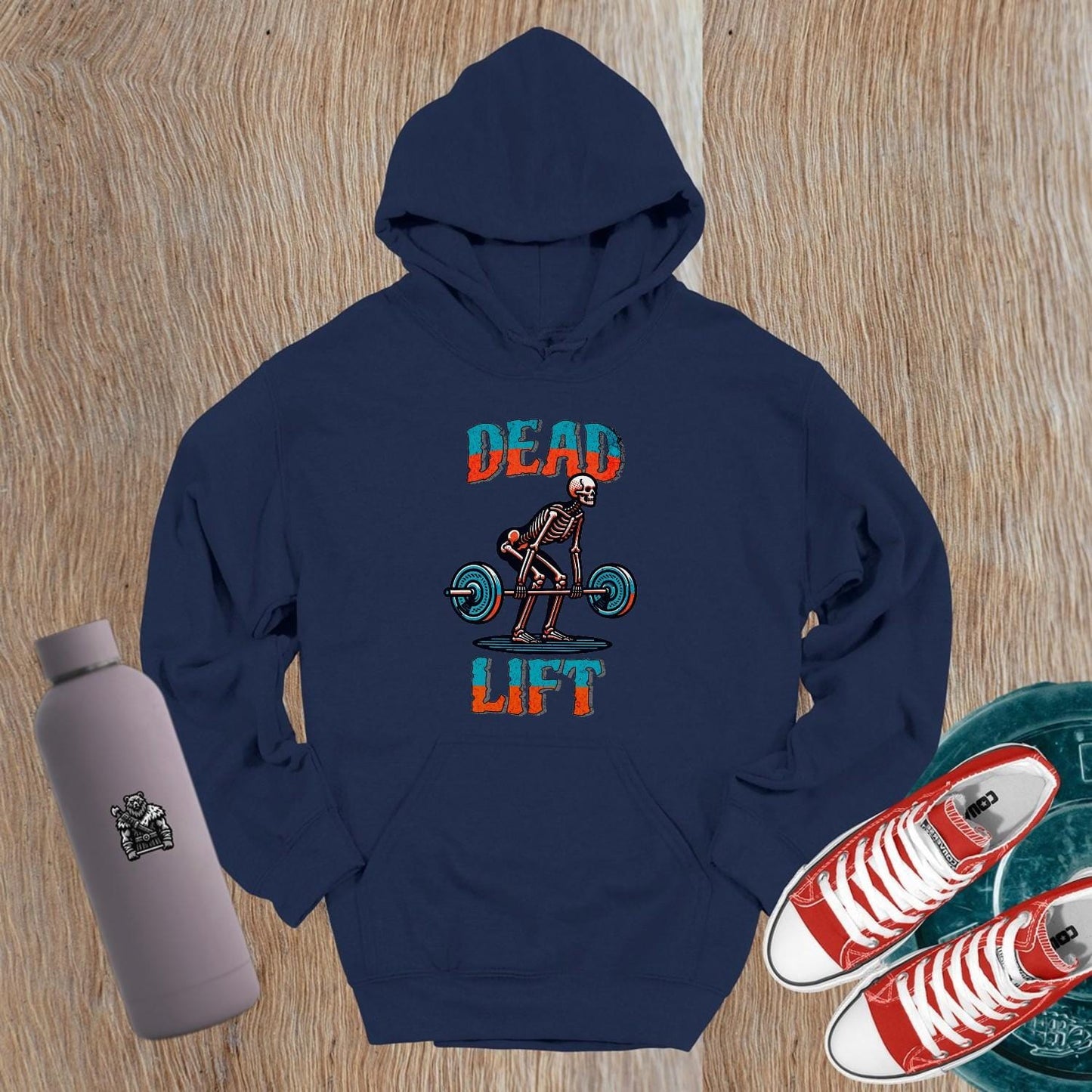 "Black 'Dead Lift' hoodie featuring a striking skeleton design, perfect for gym wear, fitness enthusiasts, and post-workout style."