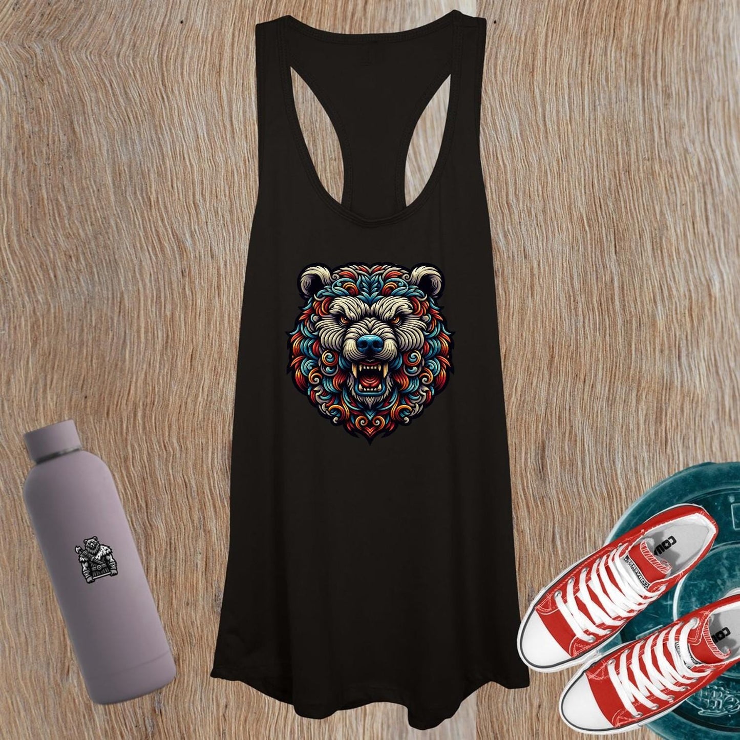 "Fierce women's tank top featuring a powerful bear graphic, perfect for workouts and casual outings. Showcases strength and confidence."