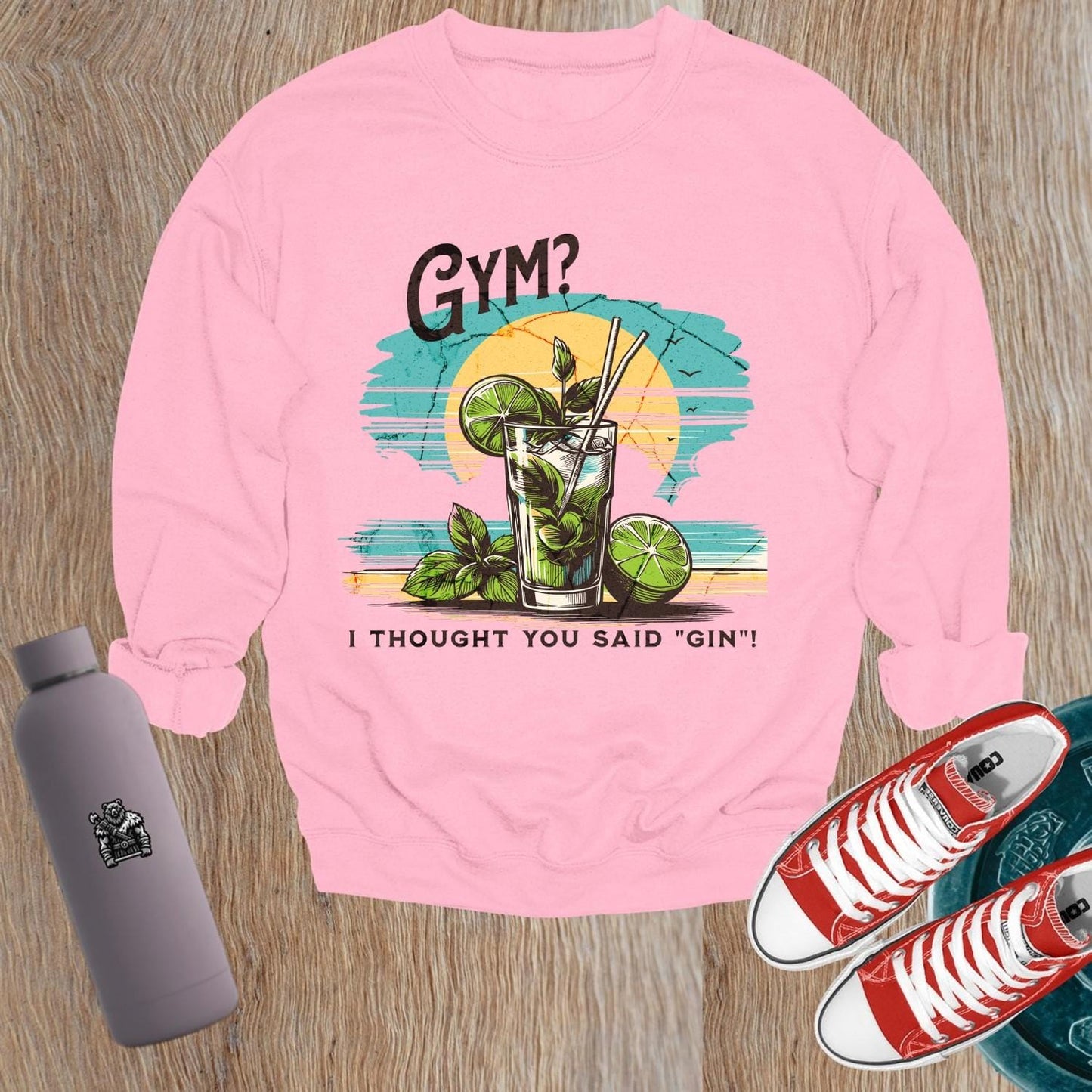 Alt text: "Lighthearted gym sweatshirt reads 'Gym? I Thought You Said Gin!' with a fun cocktail graphic, perfect for fitness enthusiasts."