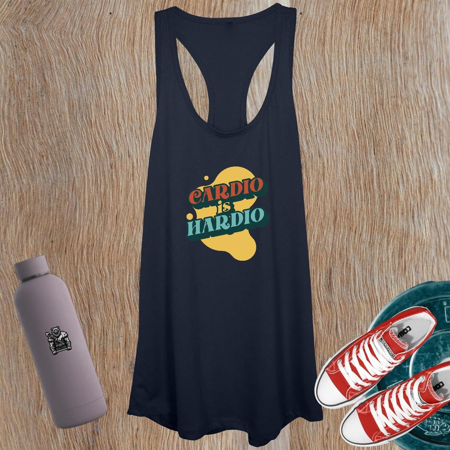 Alt text: "Women's tank top featuring a playful 'CARDIO is HARDIO' design, perfect for workouts and casual outings, showcasing a flattering fit."