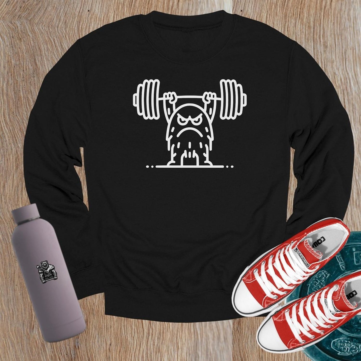 Alt text: "Bold gym crewneck sweatshirt featuring a gritty weightlifter graphic, perfect for workouts and lounging, ideal for fitness enthusiasts."