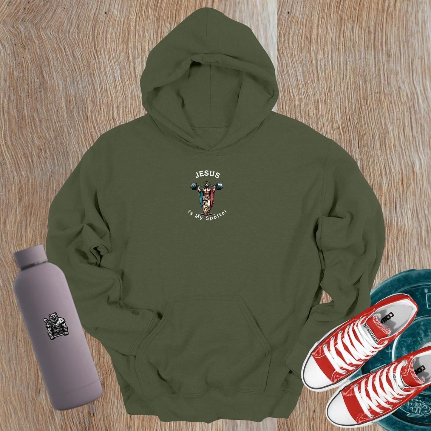 Alt text: "Black hoodie with 'Jesus Is My Spotter' graphic in bold white letters, perfect for fitness enthusiasts who embrace their faith."