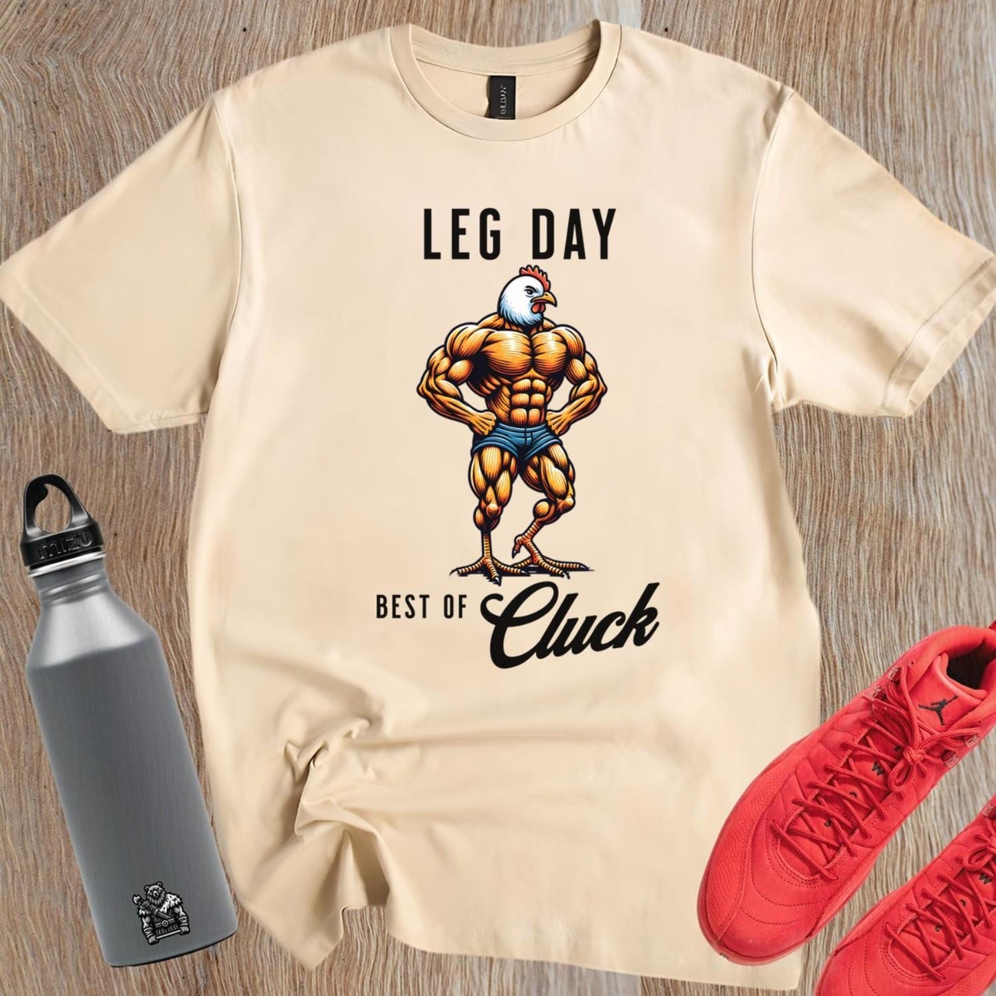 "Bold gym T-shirt featuring a unique muscular chicken design, perfect for fitness enthusiasts. Ideal for workouts, weightlifting, and cardio."