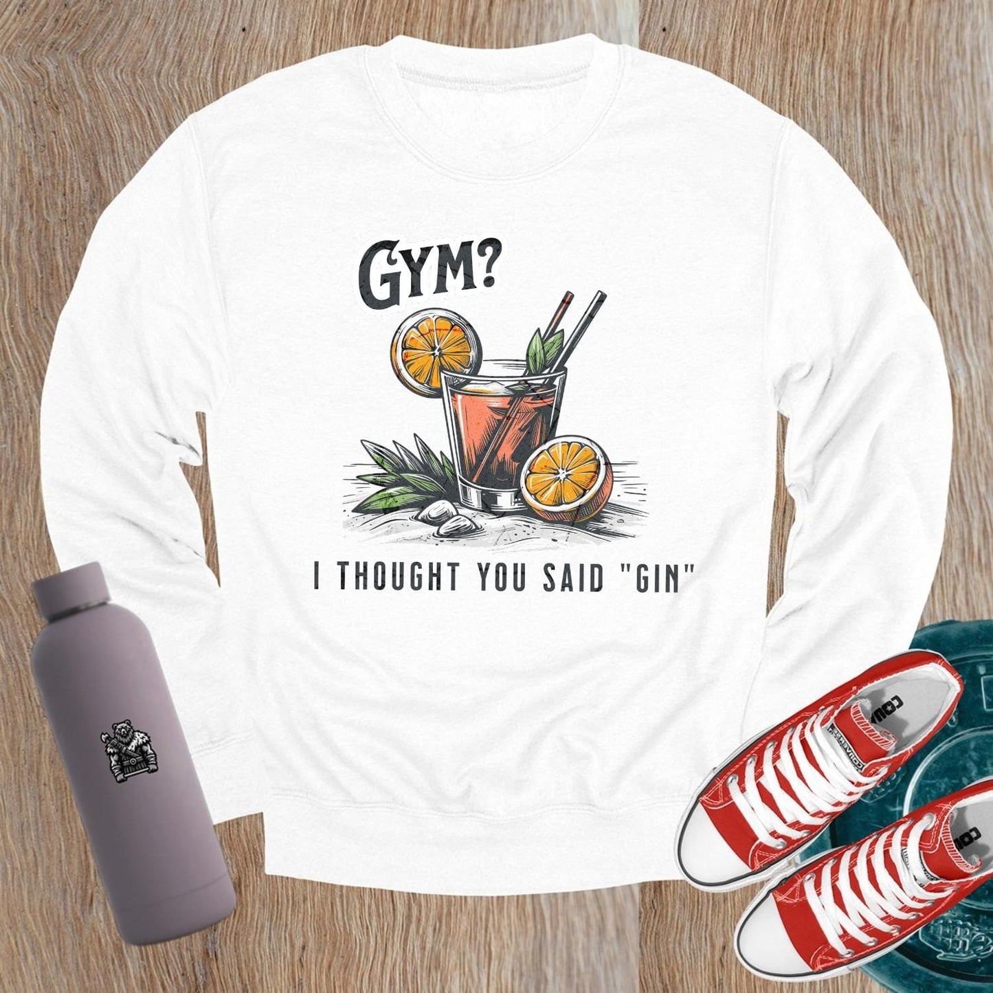 Alt text: "Playful 'Gym? I Thought You Said Gin' graphic sweatshirt for gym enthusiasts, blending fitness humor and style. Perfect for casual wear."