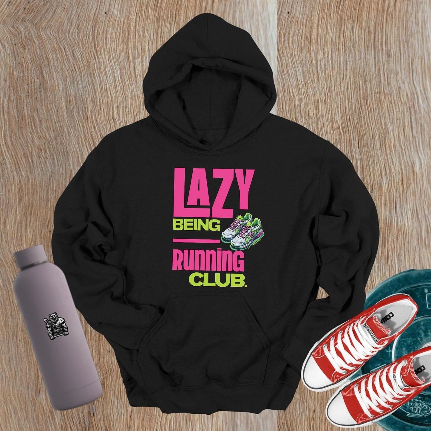 "Vibrant 'Lazy Being Running Club' hoodie featuring a playful graphic, perfect for gym workouts and lounging in style. Activewear essential!"