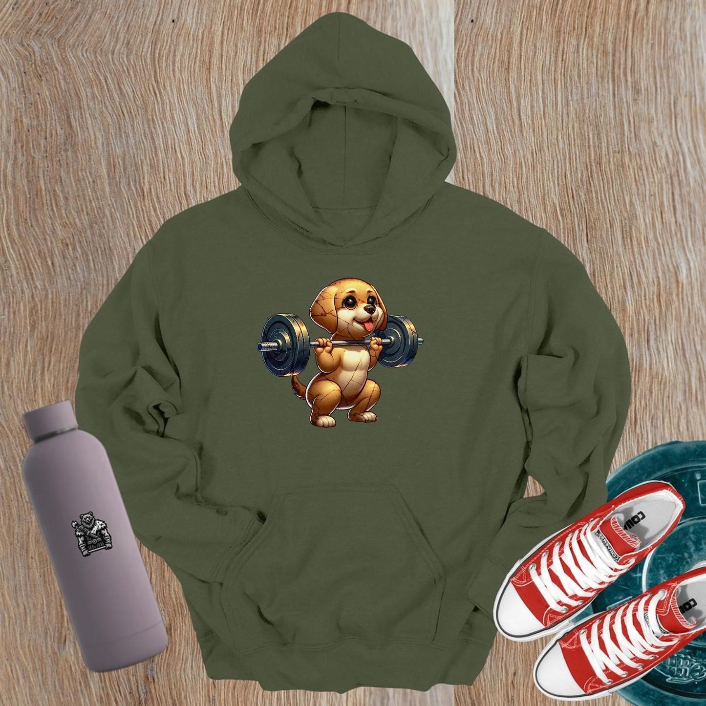 "Adorable gym hoodie featuring a playful puppy lifting weights, perfect for fitness lovers who want fun, style, and comfort in workouts."