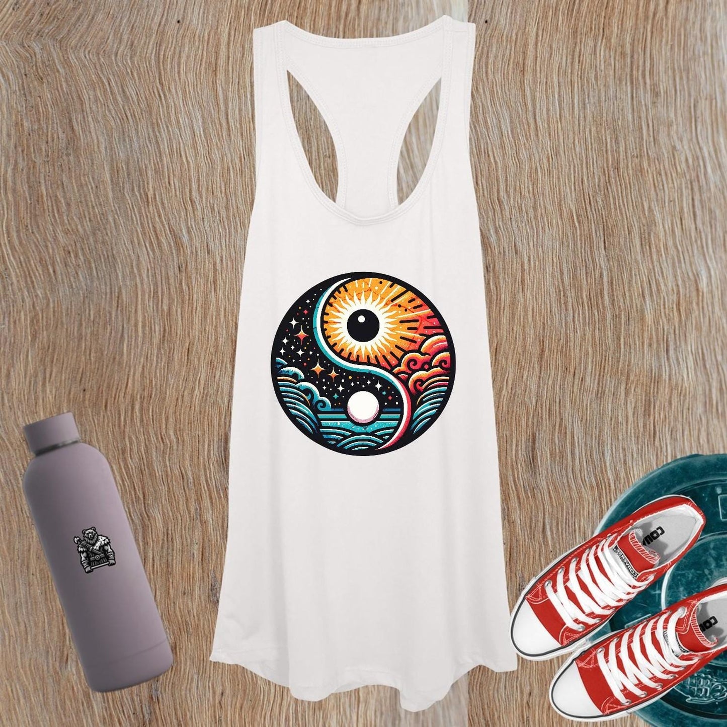 "Vibrant women's gym tank top featuring a striking yin-yang design, perfect for workouts and casual outings, embodying balance and energy."
