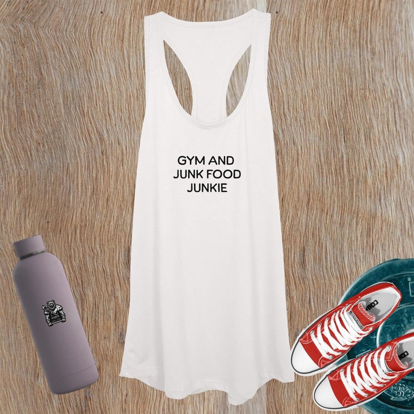 "Stylish women's gym tank top, featuring a sleek silhouette, empowering design, perfect for yoga or high-intensity workouts."