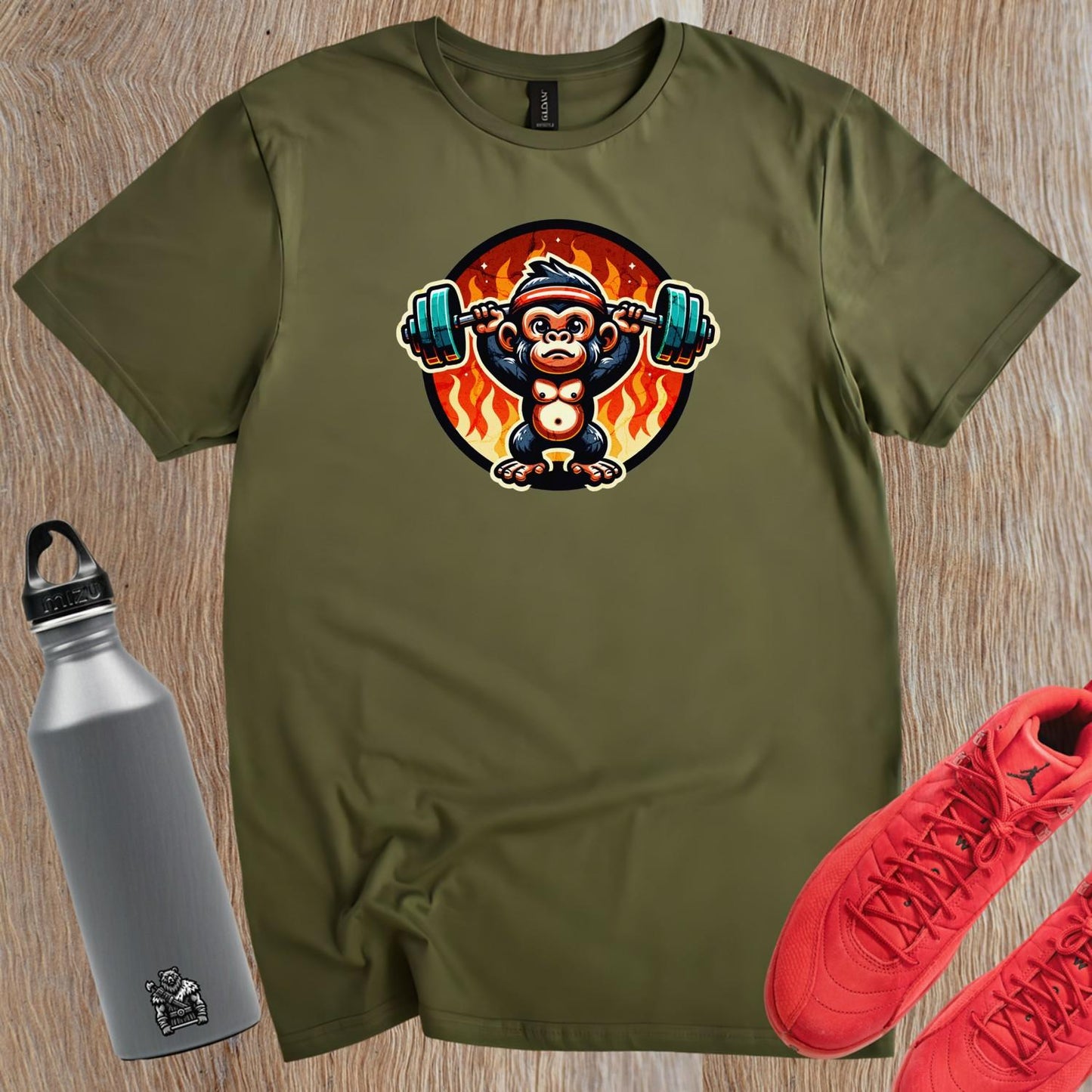 "Vibrant gym T-shirt featuring a weightlifting monkey, symbolizing strength and motivation for fitness enthusiasts. Perfect workout gear!"