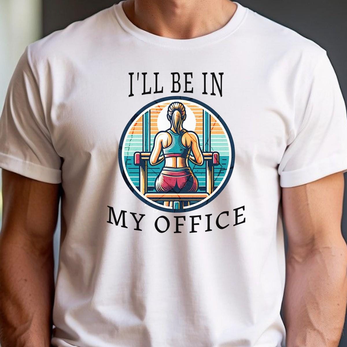 Alt text: "Stylish 'I'll Be in My Office' gym T-shirt featuring a motivational graphic, perfect for workouts and casual outings, embodies fitness passion."