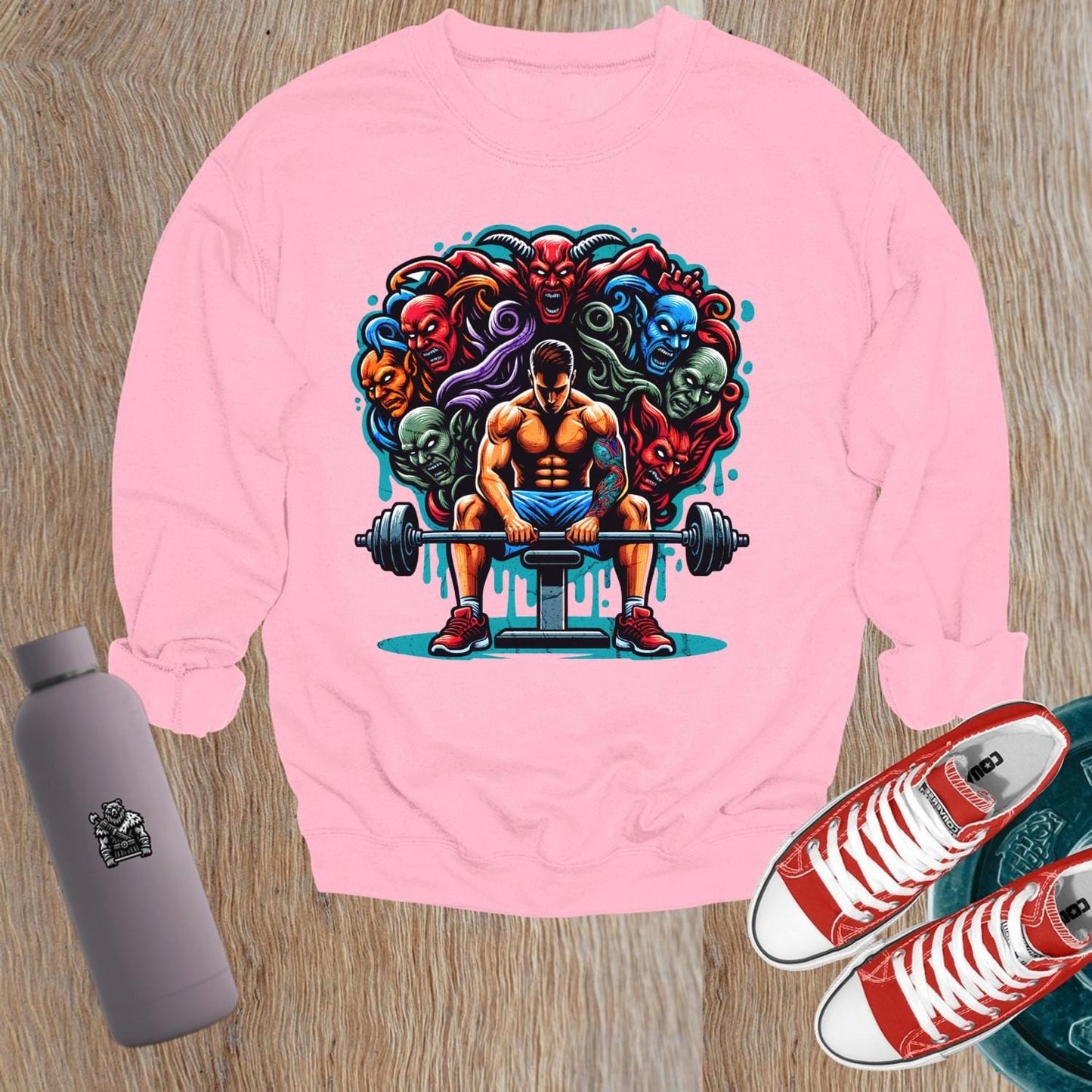"Bold gym sweatshirt featuring an inspiring graphic, designed for comfort and style, perfect for workouts and casual wear."