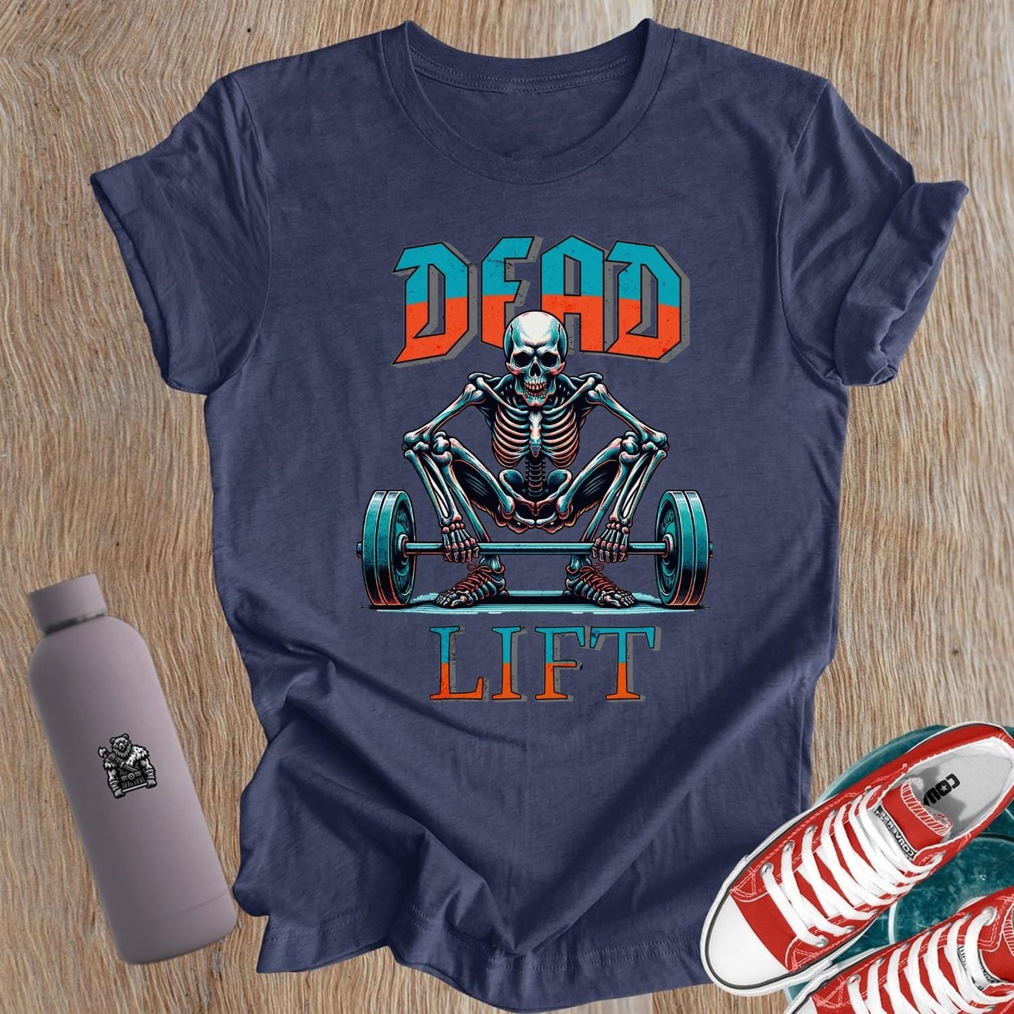"Bold women's Dead Lift T-shirt featuring an edgy skeleton design, symbolizing strength and confidence for fitness enthusiasts in the gym."