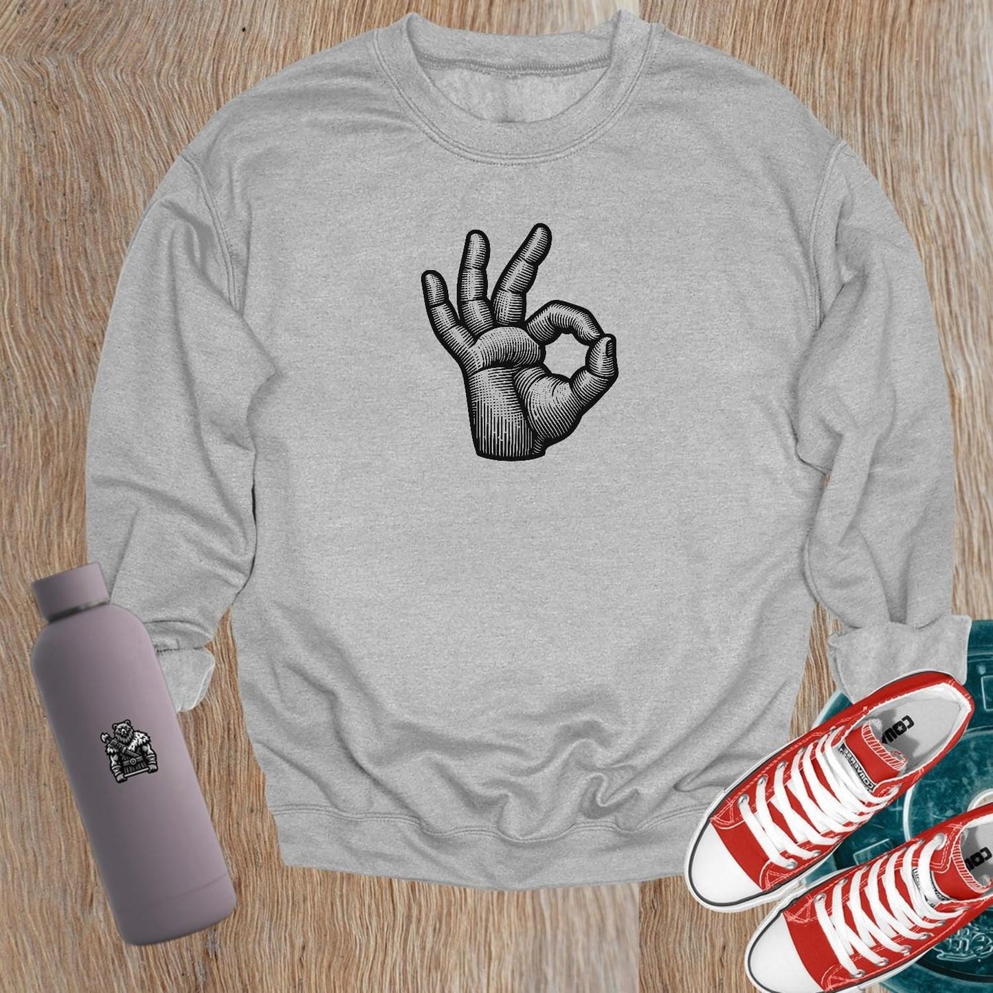 "Graphic gym crewneck sweatshirt for active lifestyle, featuring bold design, relaxed fit, and perfect for workouts or casual wear."