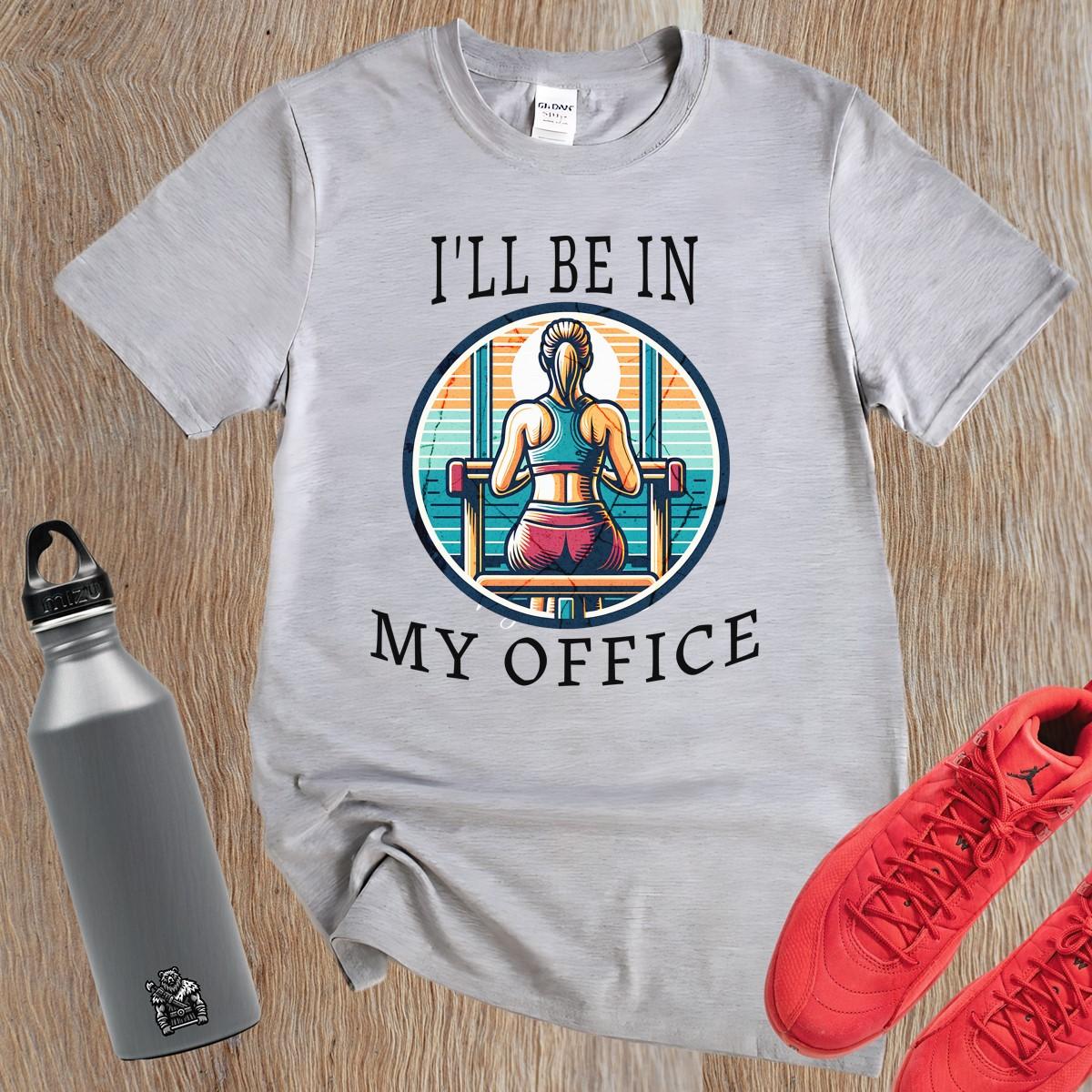 Alt text: "Stylish 'I'll Be in My Office' gym T-shirt featuring a motivational graphic, perfect for workouts and casual outings, embodies fitness passion."