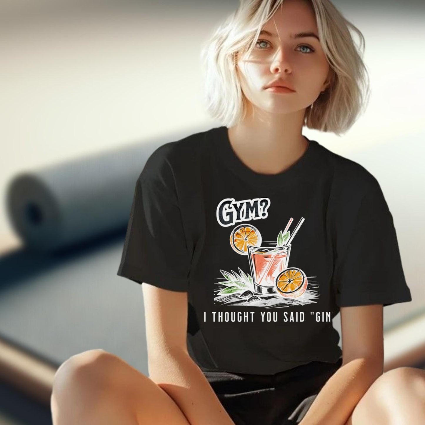 Alt text: "Cheeky 'I Thought You Said Gin' T-shirt for gym lovers, featuring a playful design perfect for workouts and casual outings."