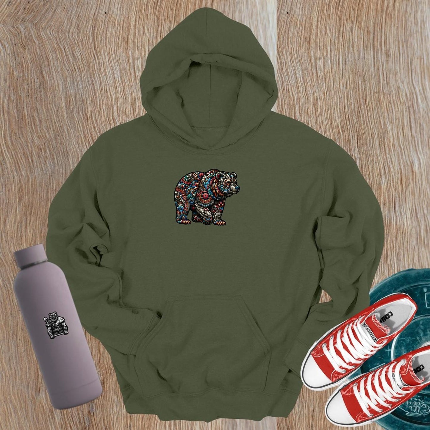 "Vibrant Bear Hoodie featuring intricate bear graphic, perfect for gym or casual wear. Symbolizes strength, resilience, and power."