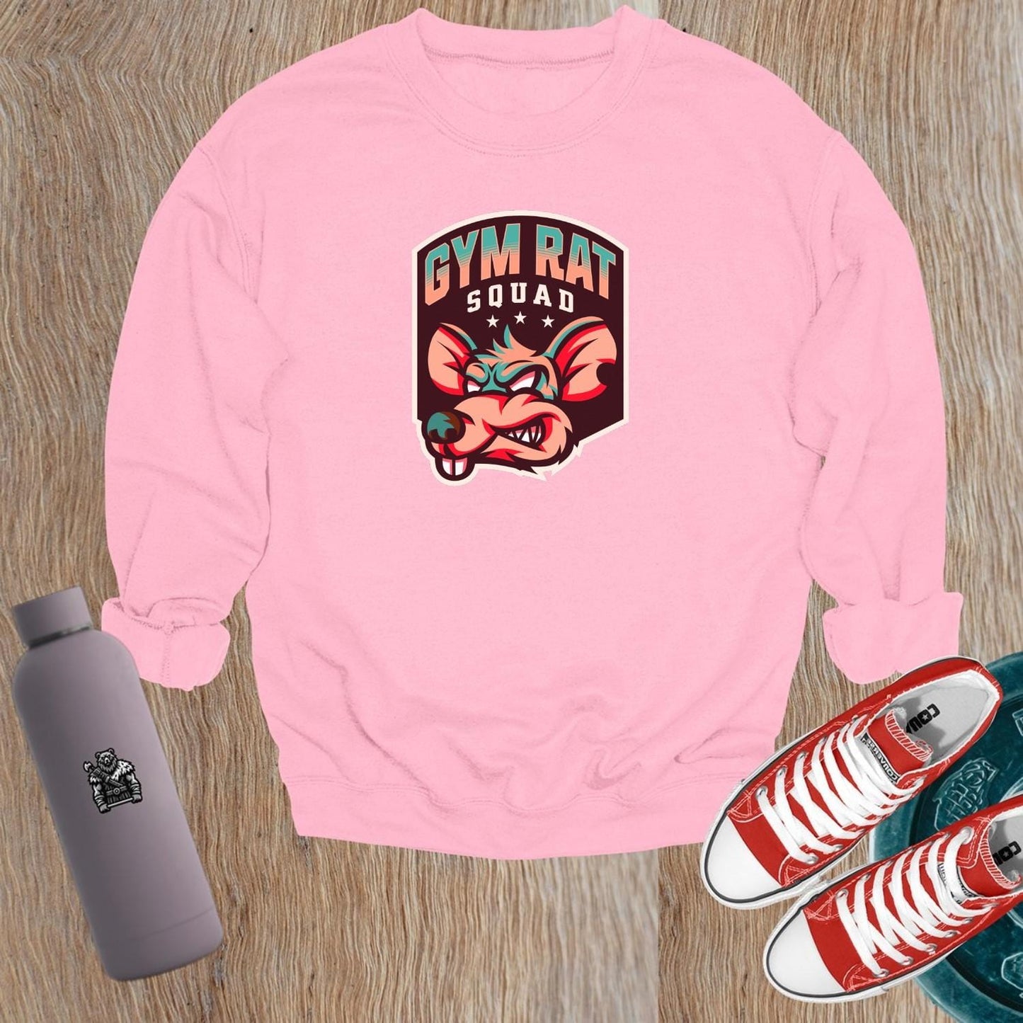 "Vibrant Gym Rat Squad sweatshirt, showcasing a motivational design for fitness lovers. Perfect for workouts or casual wear, embodying dedication."