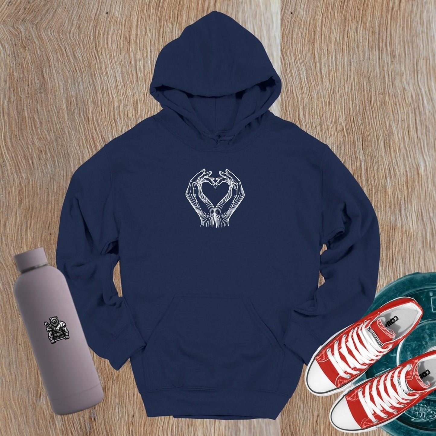 "Stylish gym hoodie with heart-shaped hand design symbolizing strength and unity, perfect for workouts and casual wear."