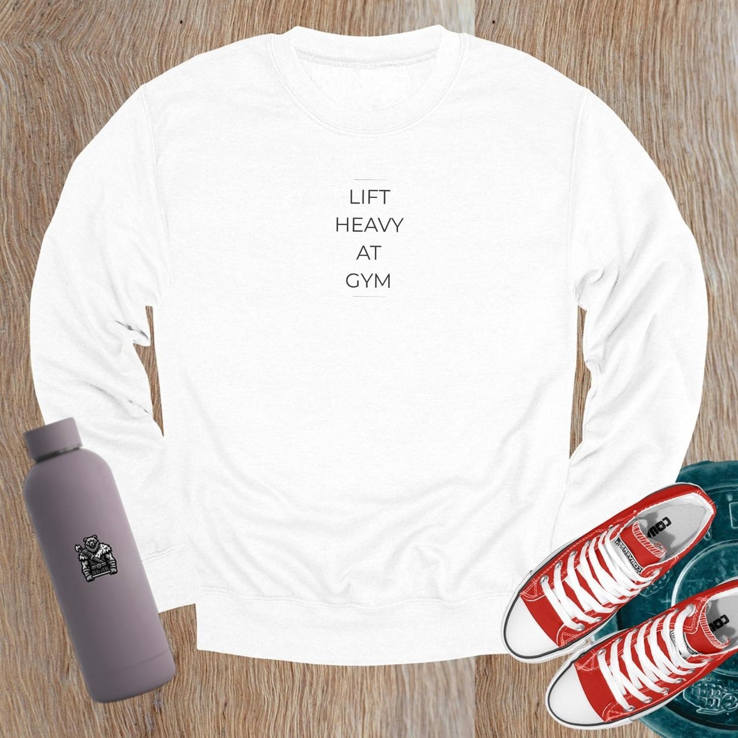 "Lift Heavy at Gym sweatshirt featuring bold lettering, designed for serious lifters, offering comfort and style for workouts."