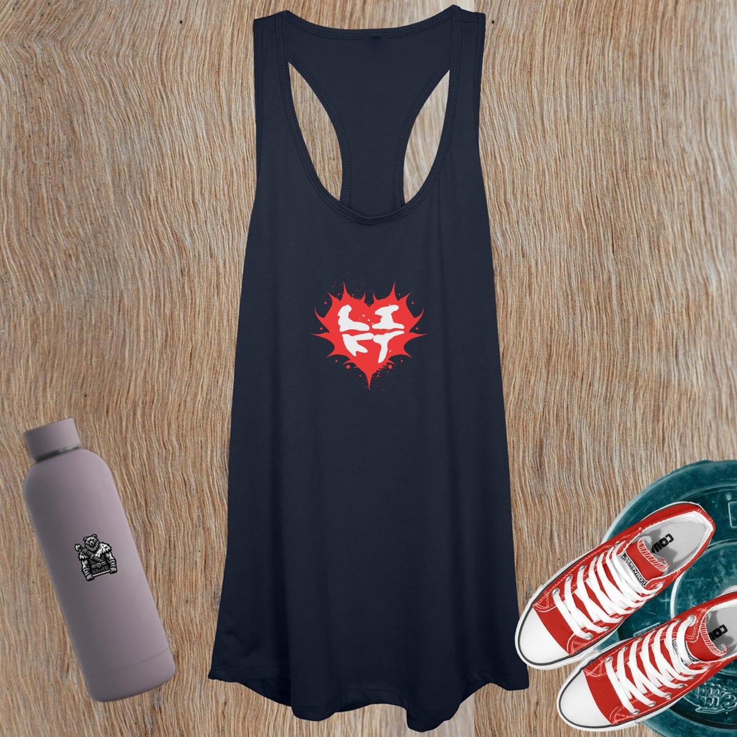 "Women's workout tank top featuring a bold heart design, symbolizing passion and power for fitness enthusiasts. Flattering fit, inspiring graphics."