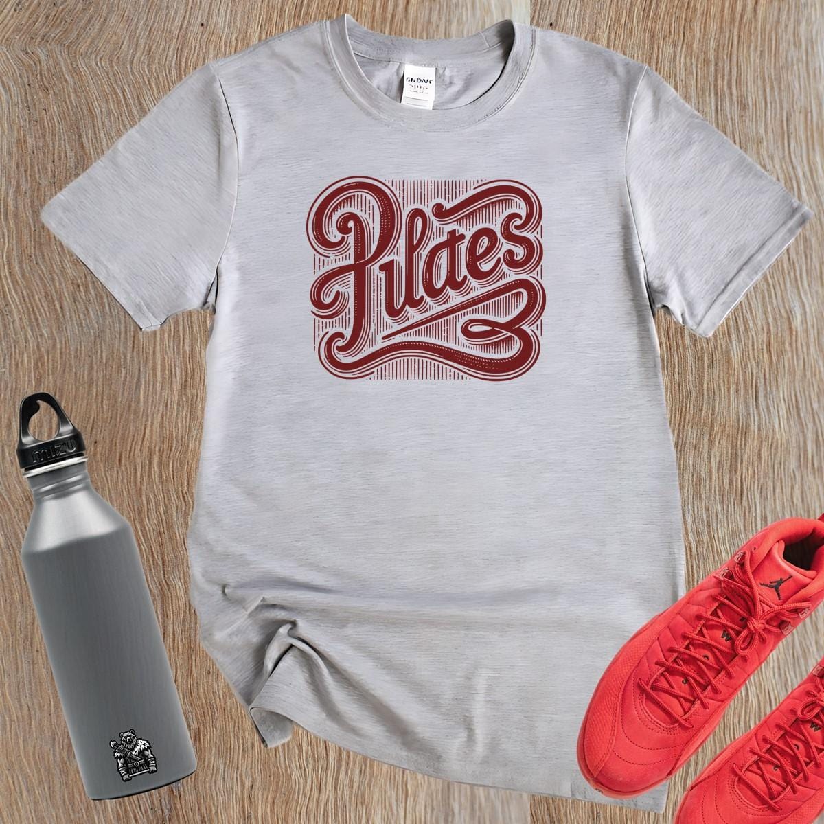 Alt text: "Stylish Pilates T-shirt featuring a bold, intricate graphic embodying wellness and discipline, perfect for fitness enthusiasts."