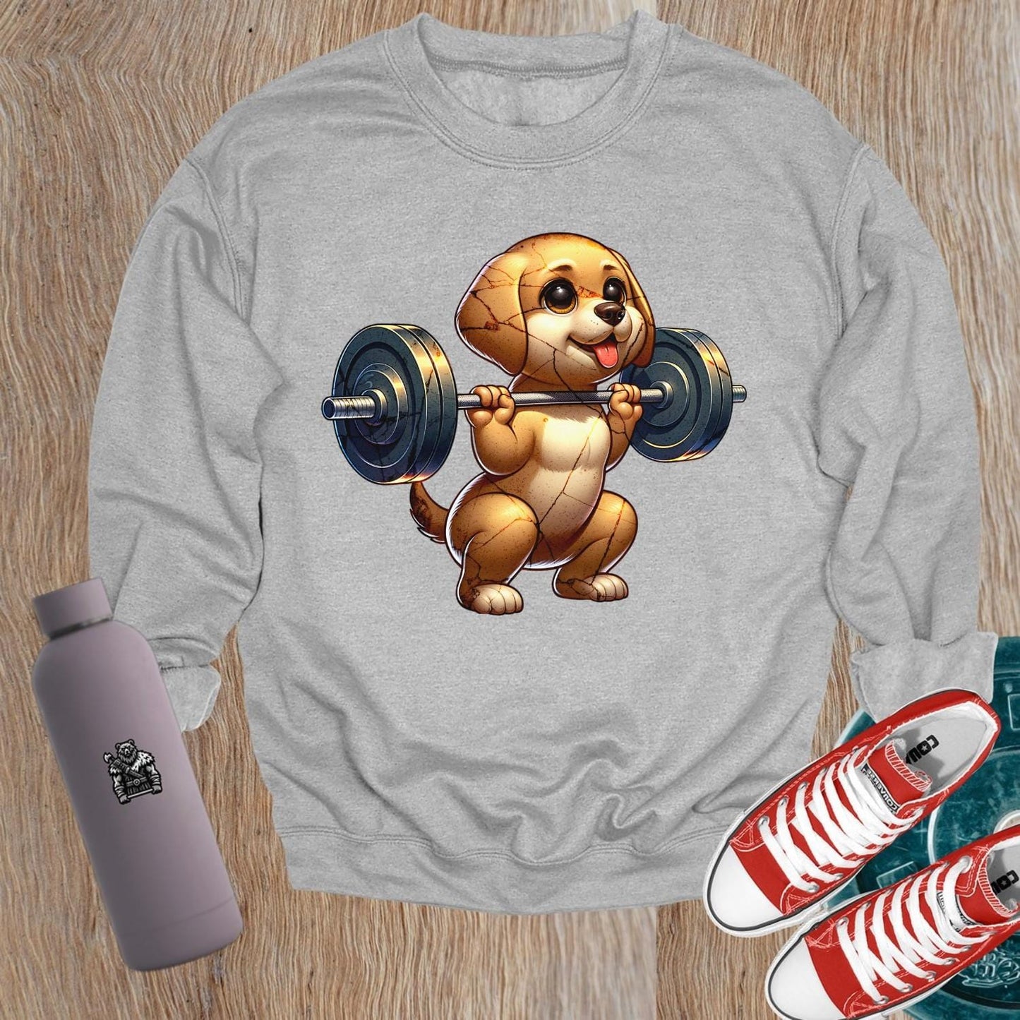 "Adorable dog lifting weights graphic on a playful gym sweatshirt, perfect for fitness lovers. Stylish, comfy, and motivational wear."