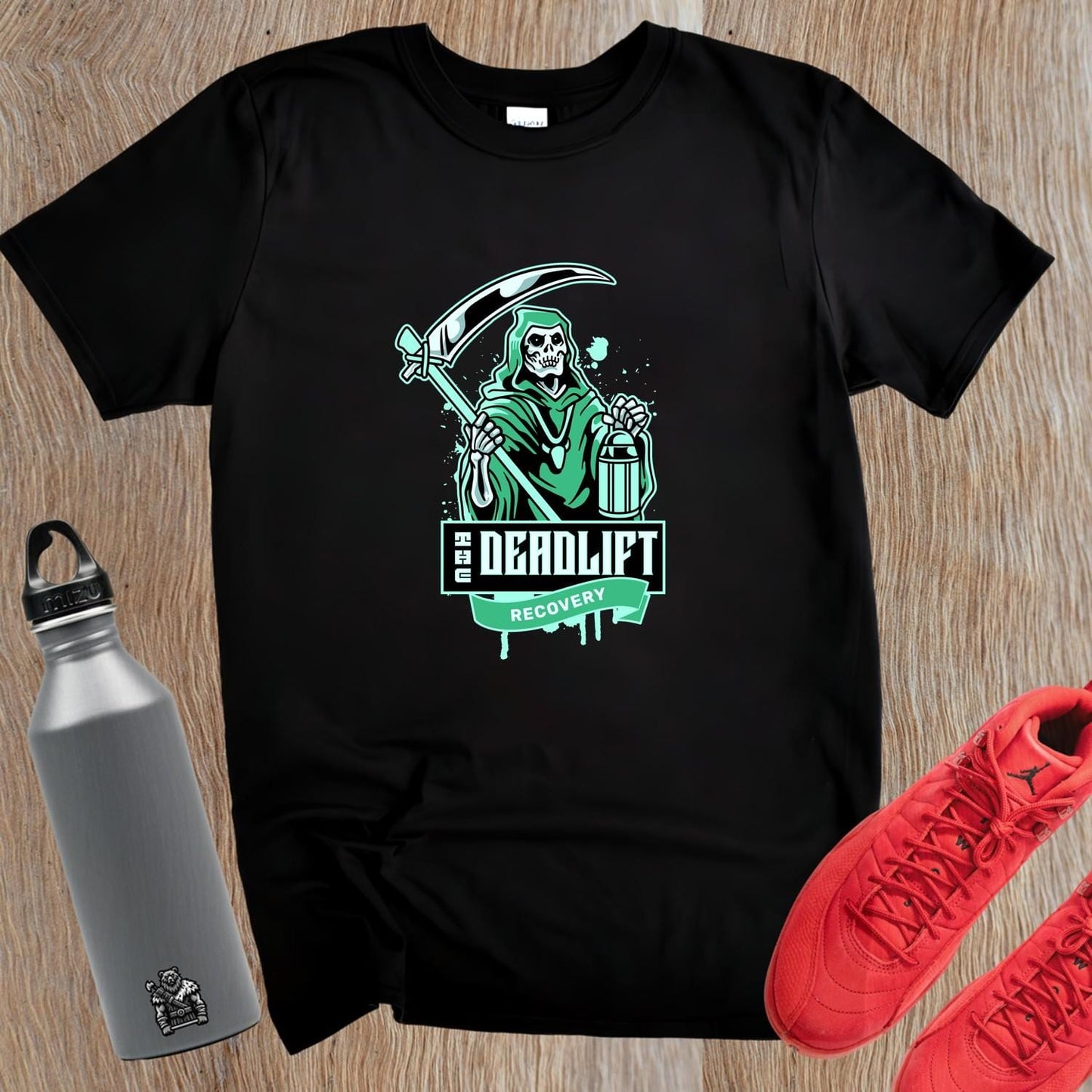 "Graphic gym t-shirt featuring bold 'Deadlift Recovery' design, perfect for fitness enthusiasts showcasing humor and strength."
