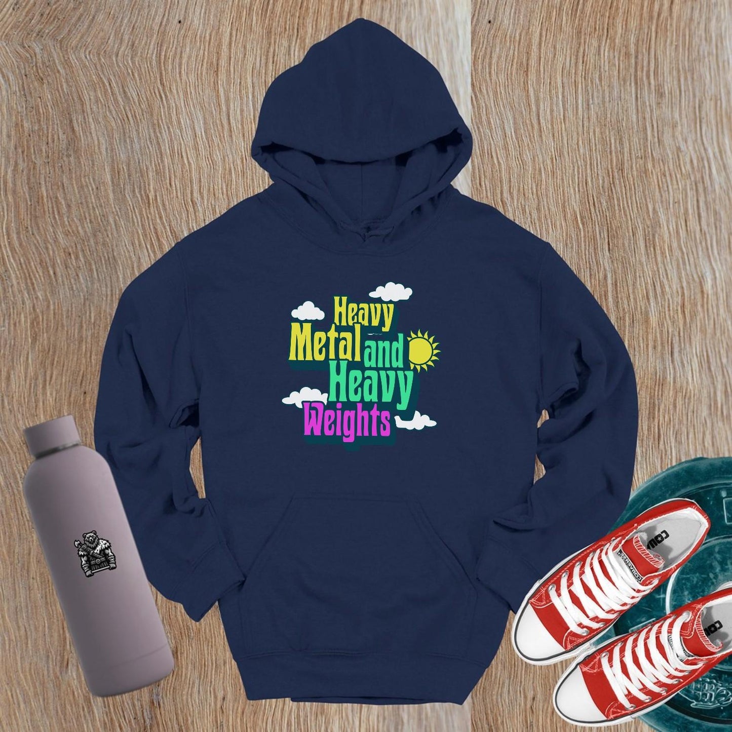 "Heavy Metal and Heavy Weights hoodie featuring vibrant graphics of weights and musical elements, perfect for fitness enthusiasts and gym lovers."
