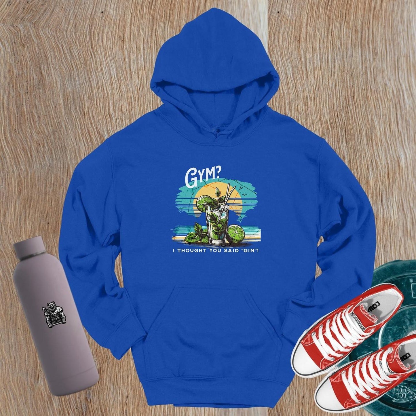 "Humorous 'Gym? I Thought You Said Gin' hoodie in vibrant colors, perfect for gym lovers and casual outings, showcasing playful style."