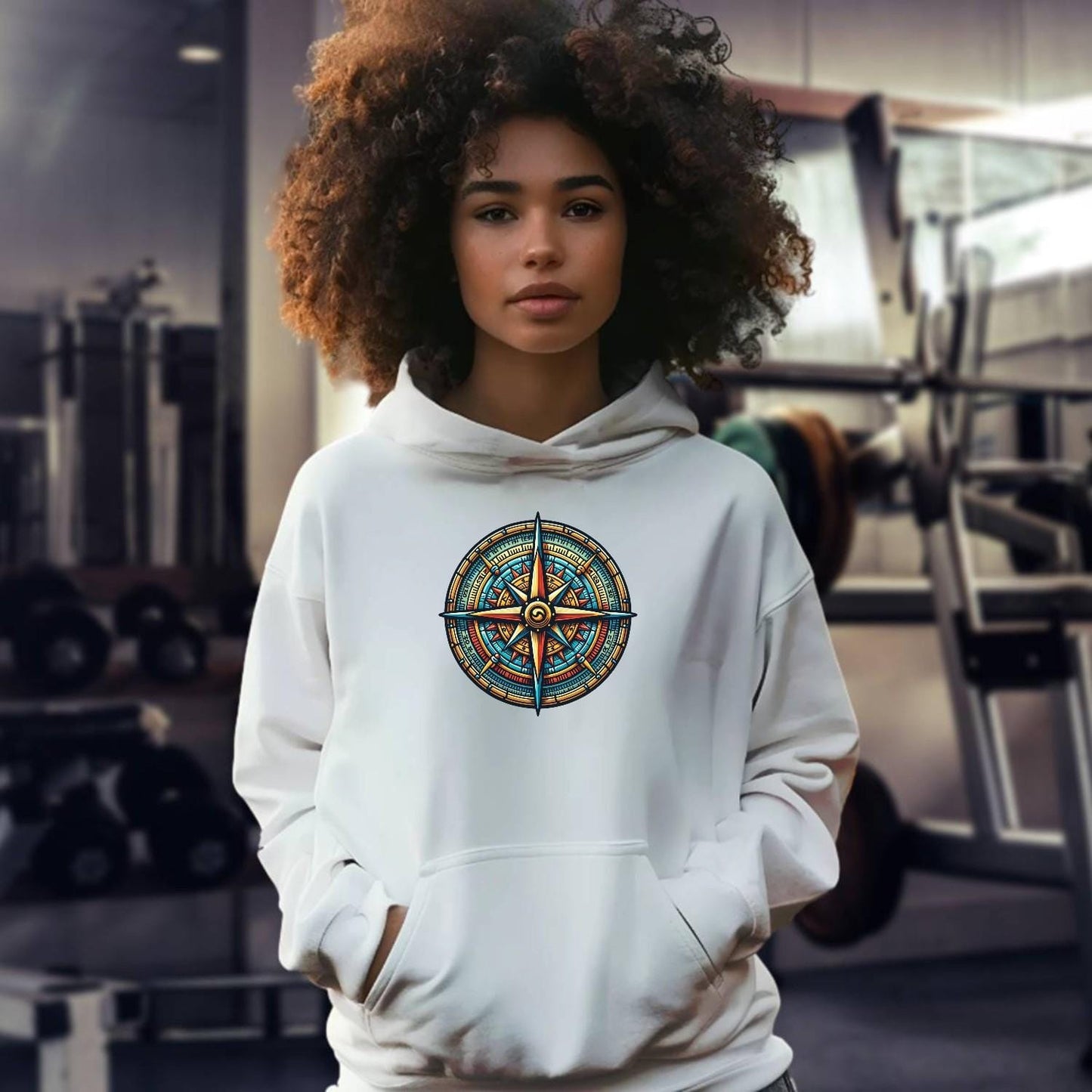 "Vibrant compass design hoodie for gym and casual wear, featuring bold colors and unique graphic symbolizing fitness journey and adventure."