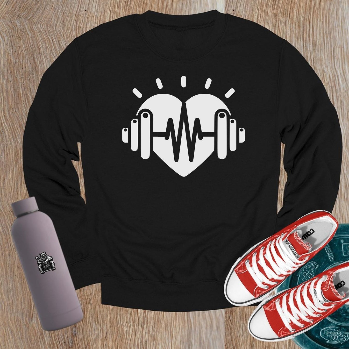"Bold gym crewneck sweatshirt with empowering strength graphic, perfect for workouts or casual wear. Comfortable and stylish activewear."
