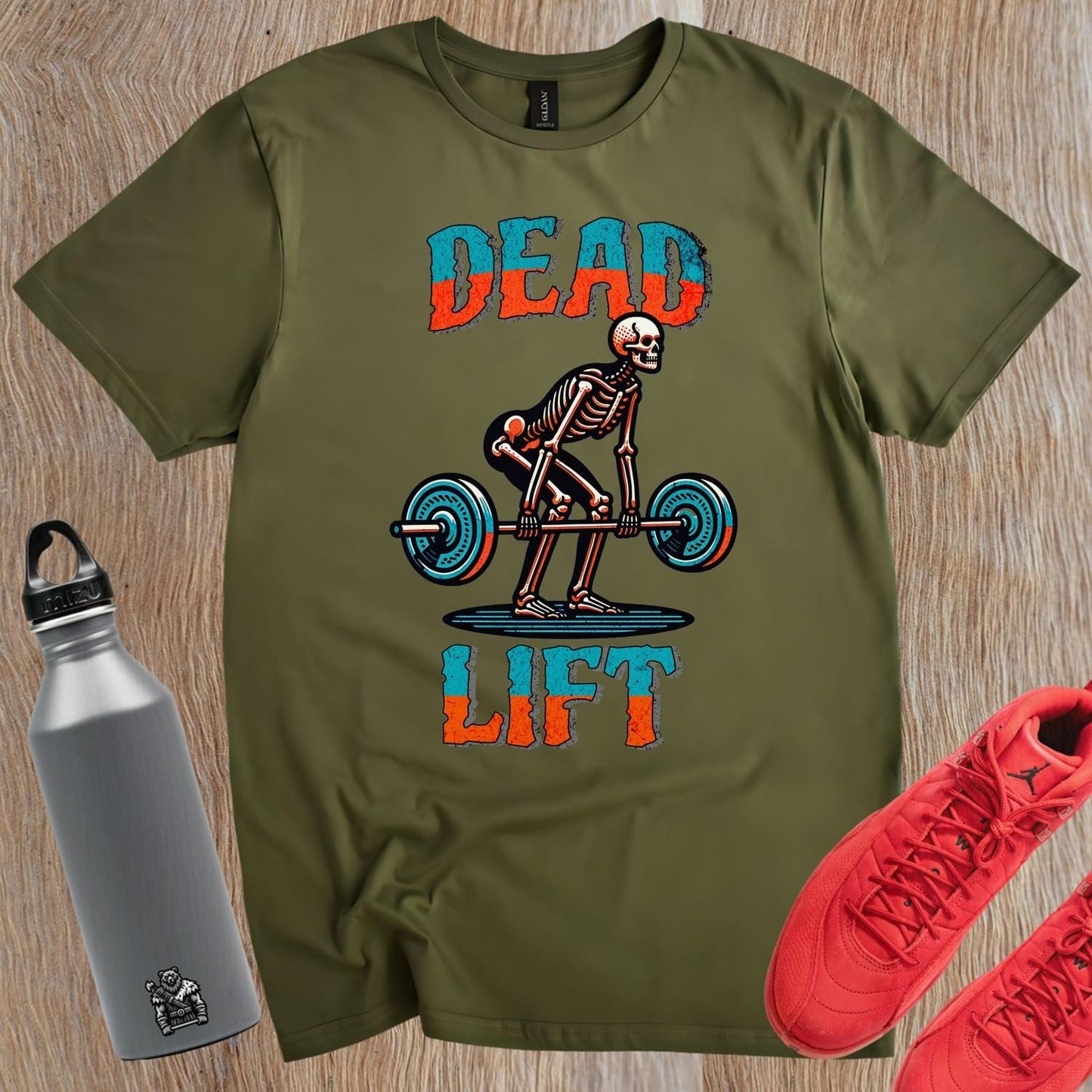 "Black 'Dead Lift' T-shirt featuring a bold skeleton graphic, ideal for fitness enthusiasts, showcasing passion for weightlifting."