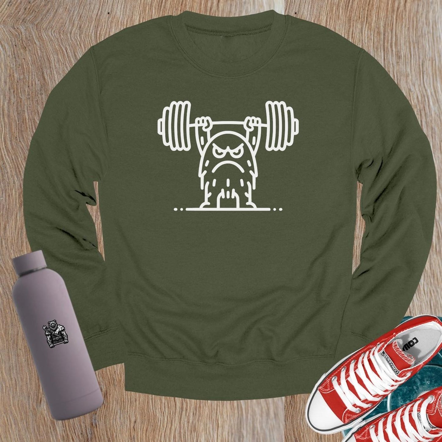 Alt text: "Bold gym crewneck sweatshirt featuring a gritty weightlifter graphic, perfect for workouts and lounging, ideal for fitness enthusiasts."