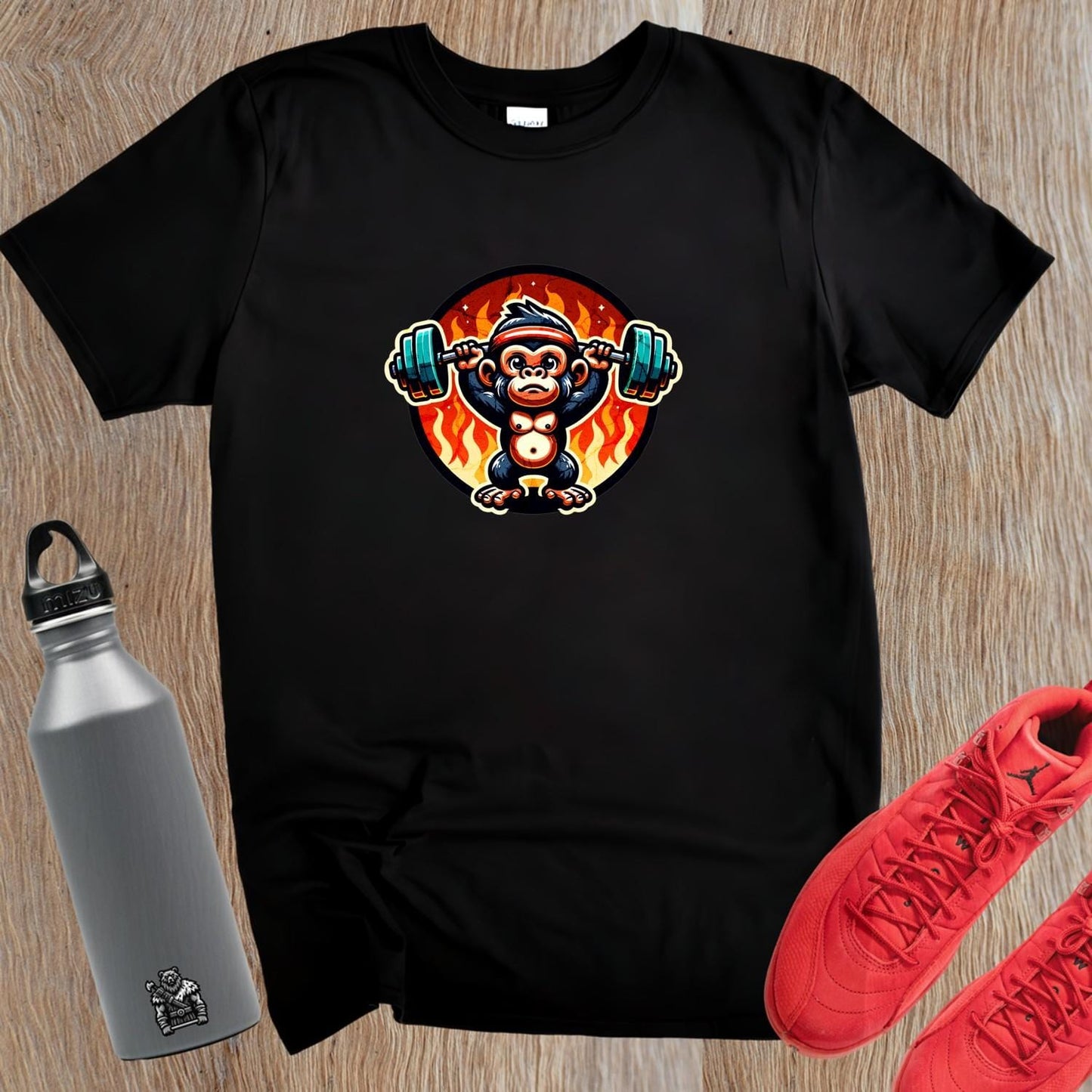 "Vibrant gym T-shirt featuring a weightlifting monkey, symbolizing strength and motivation for fitness enthusiasts. Perfect workout gear!"