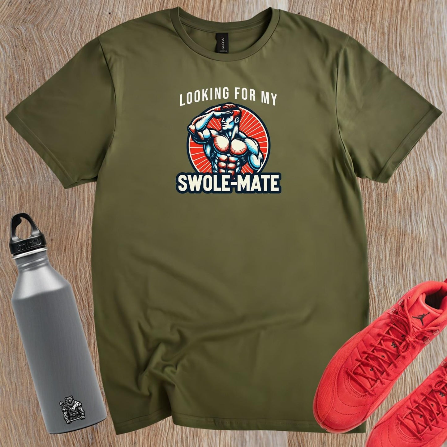 Alt text: "Swole-Mate T-shirt design featuring bold lettering and a fit silhouette, perfect for gym workouts and casual outings. Show your dedication to fitness and join the community of fitness enthusiasts."