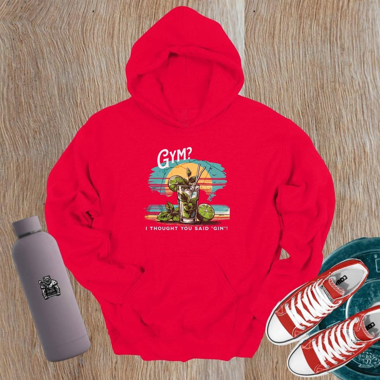 "Humorous 'Gym? I Thought You Said Gin' hoodie in vibrant colors, perfect for gym lovers and casual outings, showcasing playful style."