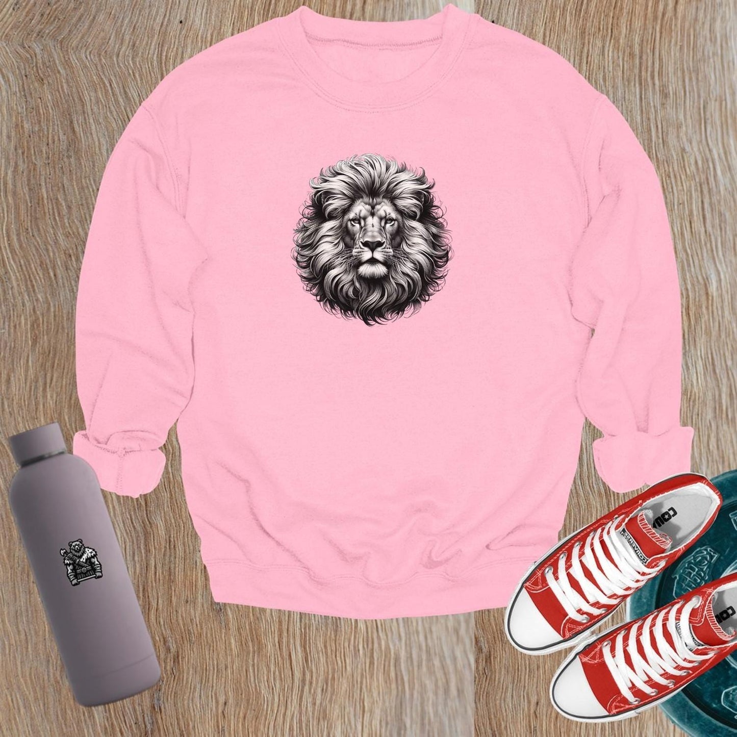 "Fierce lion graphic sweatshirt for gym enthusiasts, showcasing a powerful lion design symbolizing strength and resilience for workouts."