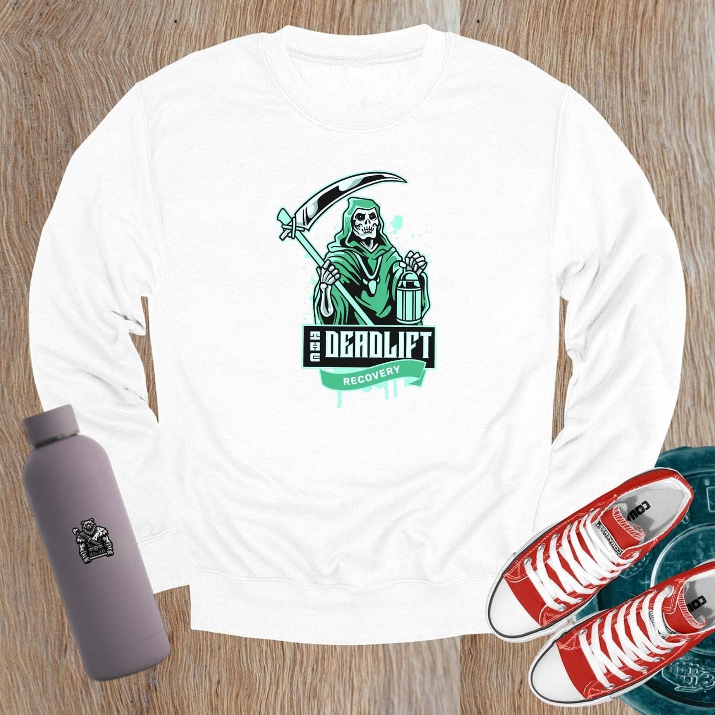 "Graphic sweatshirt featuring a bold lifter design, ideal for gym enthusiasts. Perfect for post-workout comfort and style."