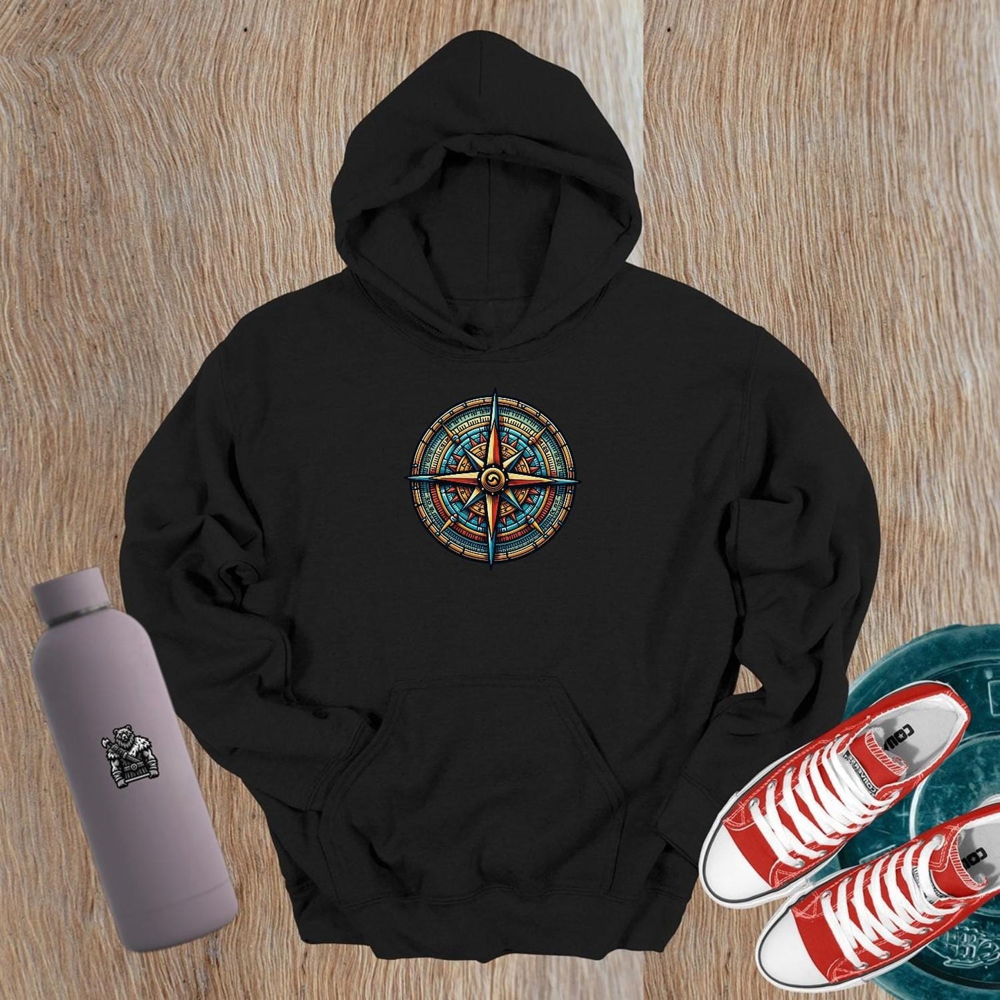 "Vibrant Compass Hoodie for gym enthusiasts features an intricate compass design, perfect for stylish layering pre- or post-workout."