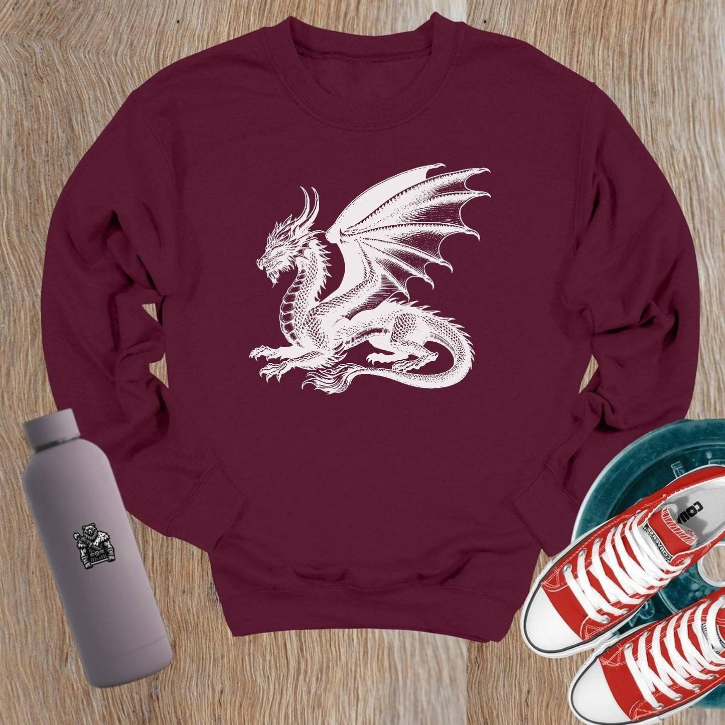 "Fierce dragon graphic on a bold crewneck sweatshirt, perfect for workouts and casual wear. Elevate your gym style with comfort."