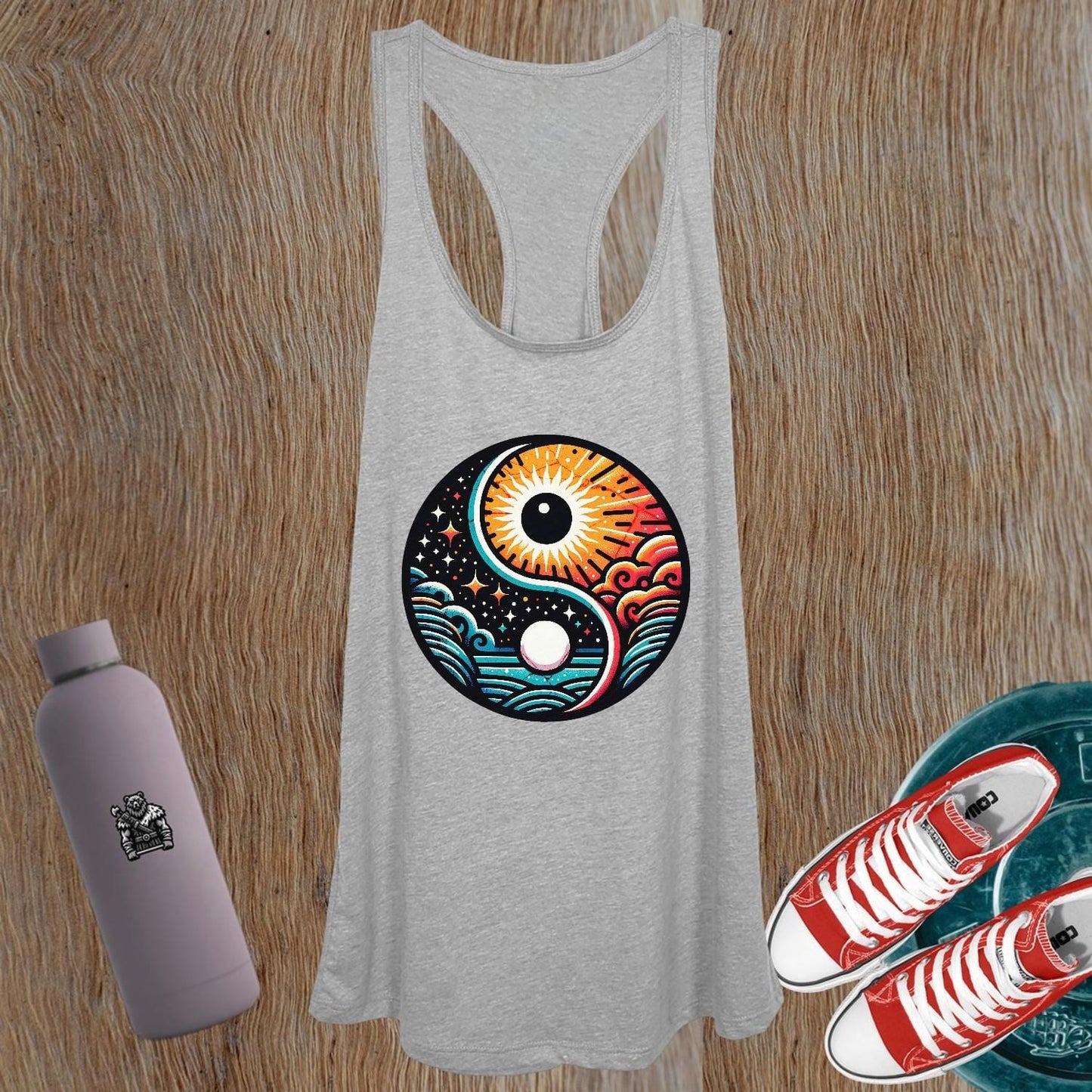 "Vibrant women's gym tank top featuring a striking yin-yang design, perfect for workouts and casual outings, embodying balance and energy."