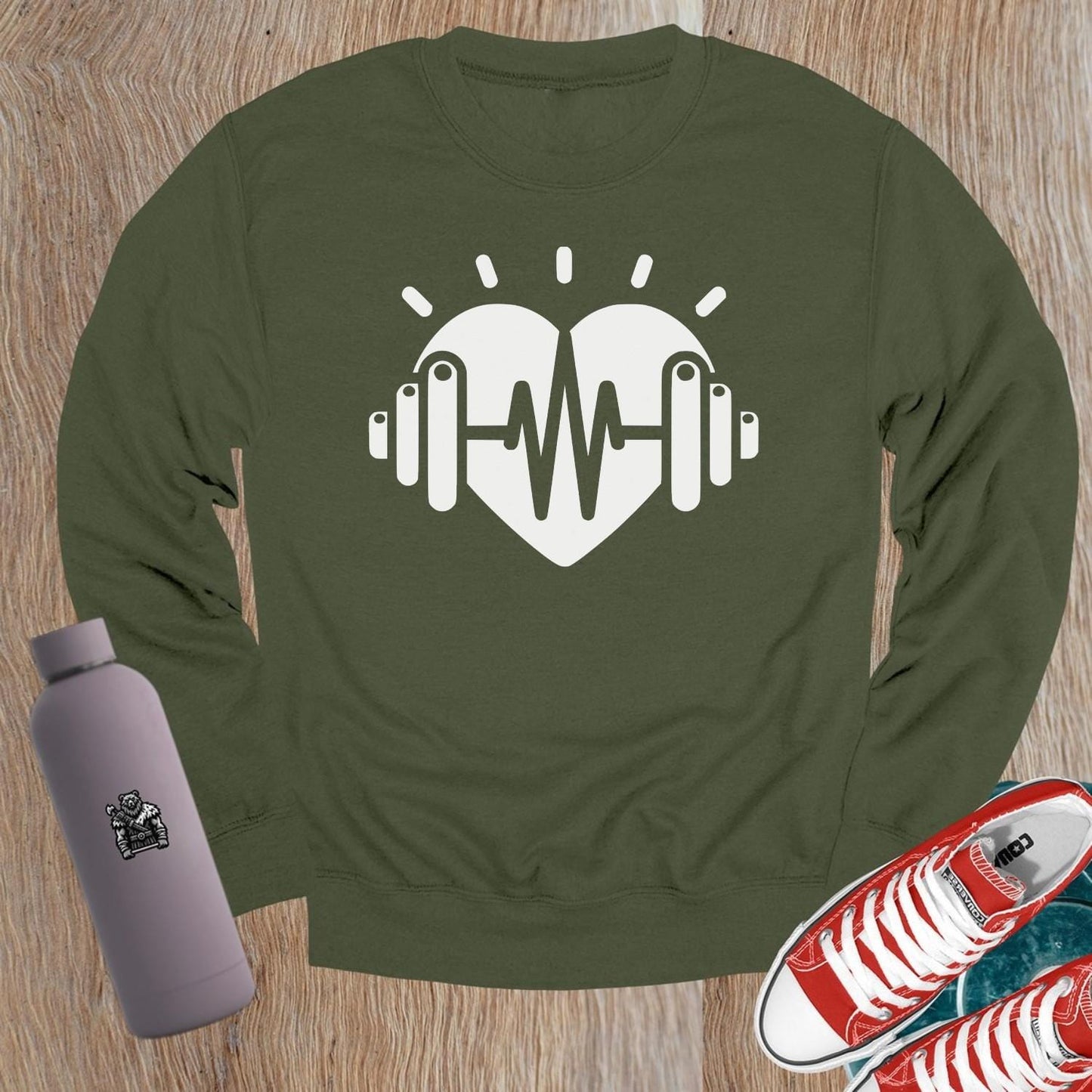 "Bold gym crewneck sweatshirt with empowering strength graphic, perfect for workouts or casual wear. Comfortable and stylish activewear."