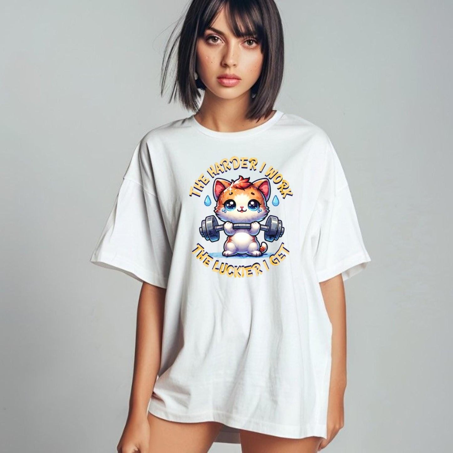 "Vibrant gym T-shirt featuring a determined kitty lifting weights, inspiring fitness enthusiasts with playful motivation for workouts."